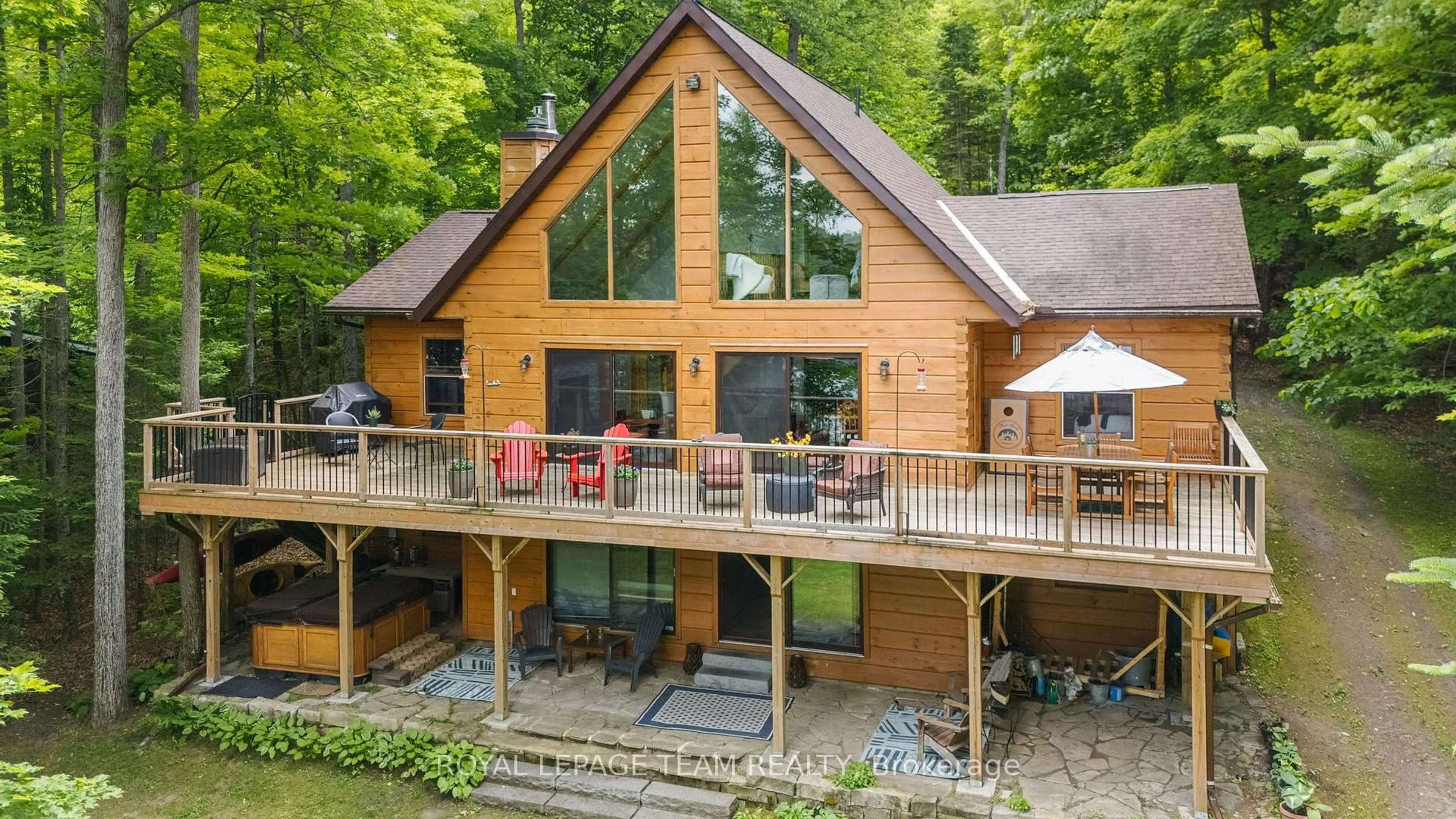 A pic from outside/outdoor area/front of a property/back of a property/a pic from drone, water/lake/river/ocean view for 512 Elsie Lane, Calabogie Ontario K0J 1H0