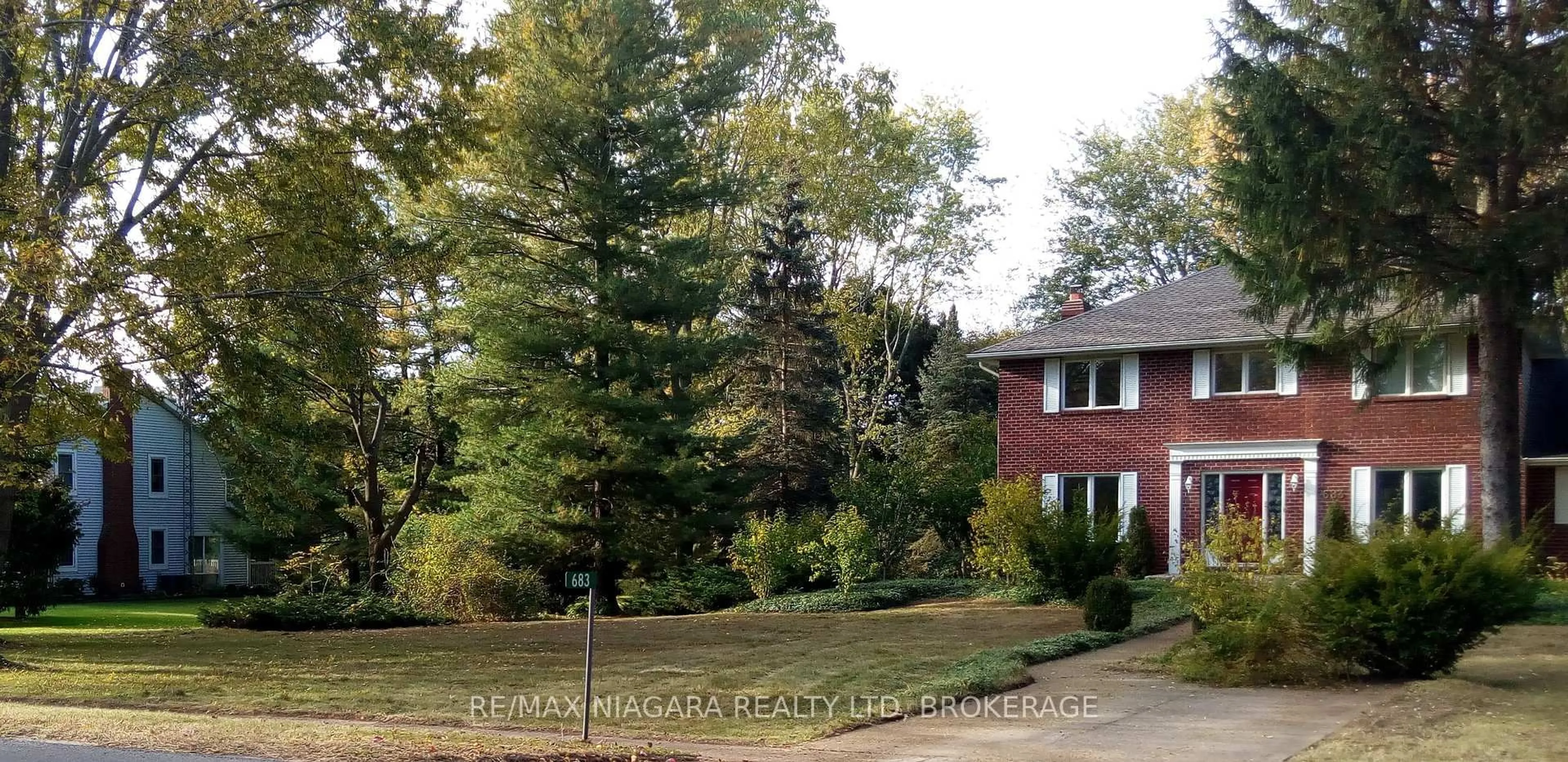 Home with brick exterior material, forest/trees view for 683 Canboro Rd, Pelham Ontario L0S 1C0