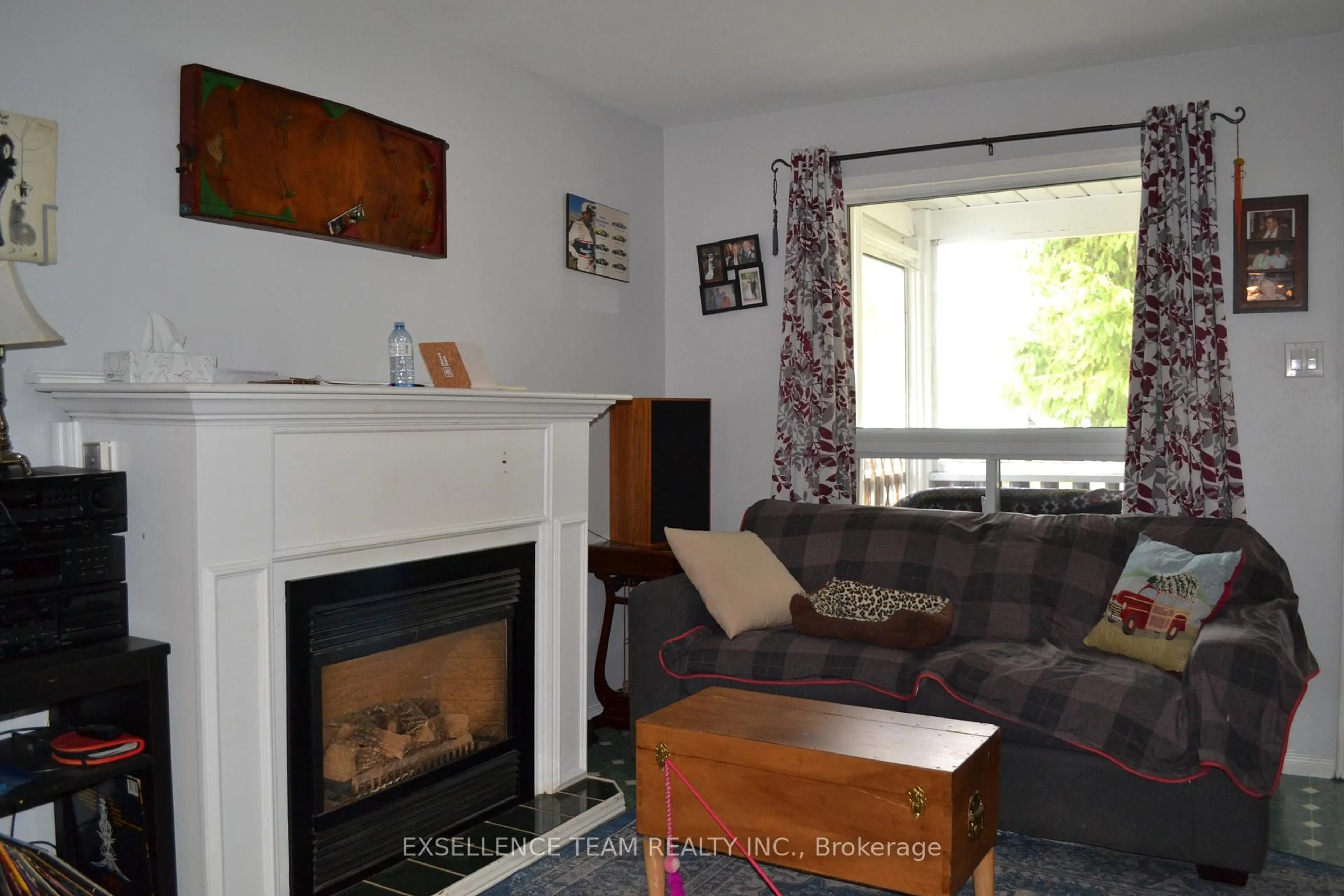Living room with furniture, wood/laminate floor for 4160 Lancaster St, South Glengarry Ontario K0C 1L0