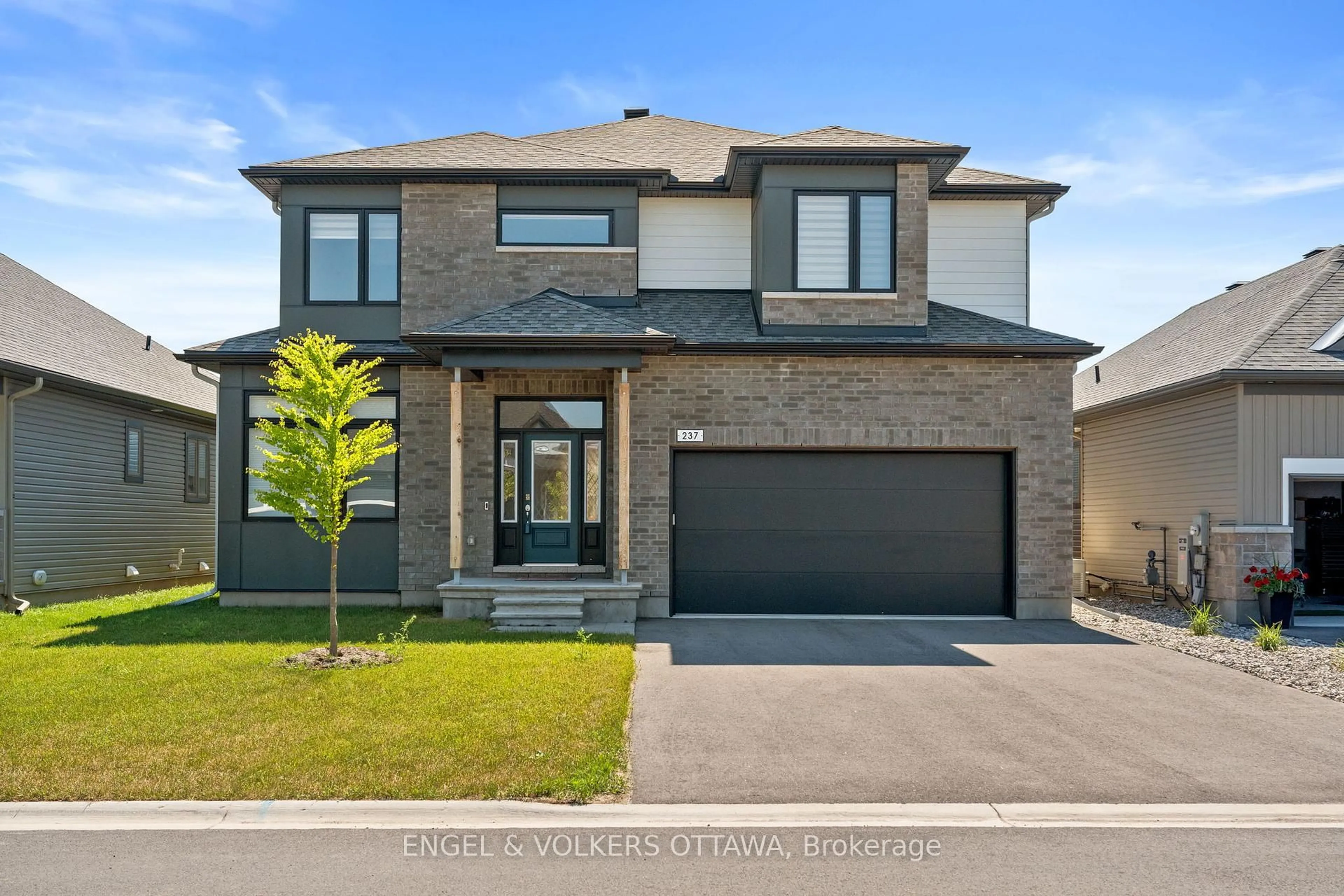 Home with brick exterior material, street for 237 Kinderwood Way, North Grenville Ontario K0G 1J0