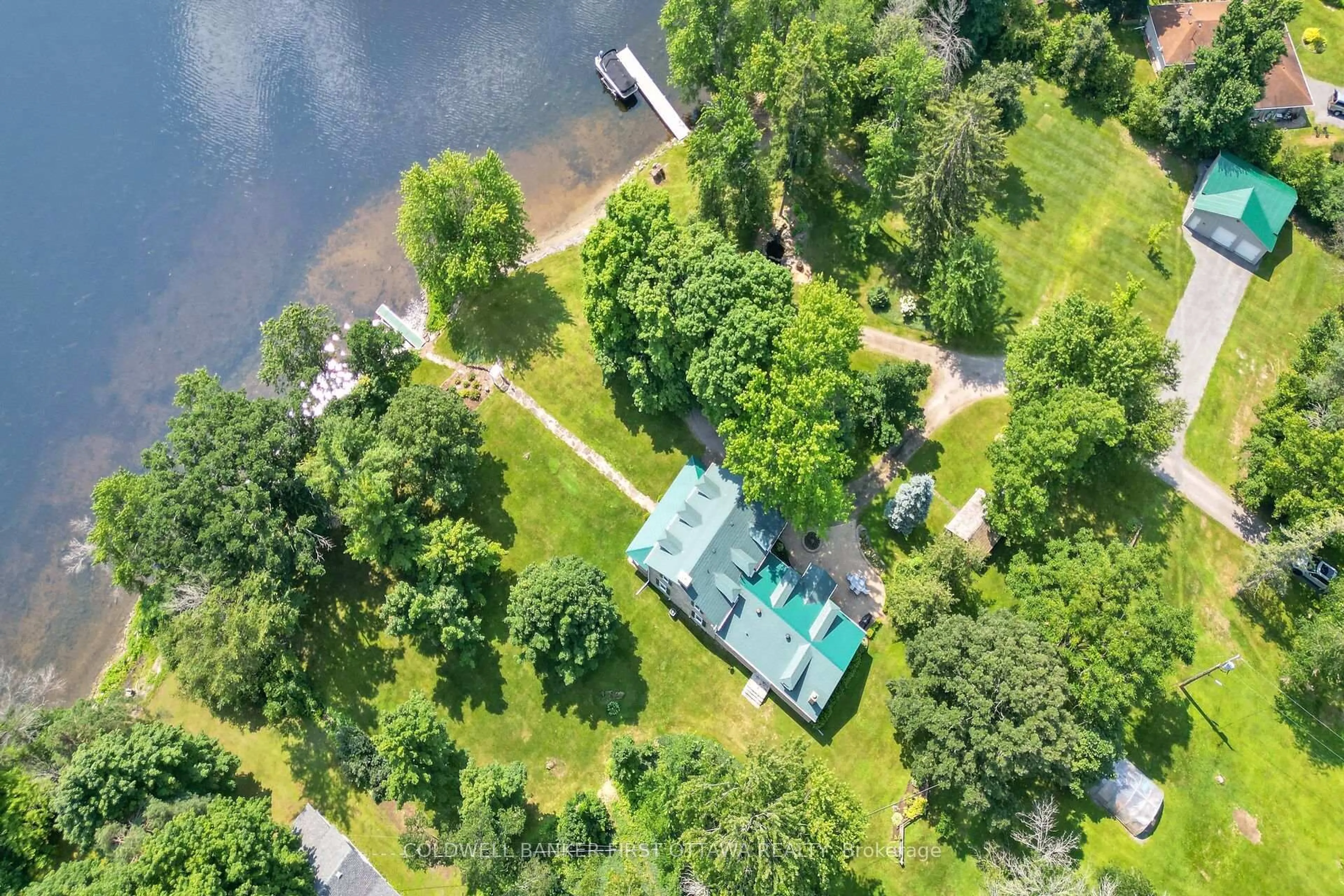 A pic from outside/outdoor area/front of a property/back of a property/a pic from drone, water/lake/river/ocean view for 100 Loch End Rd, Beckwith Ontario K7C 0S9