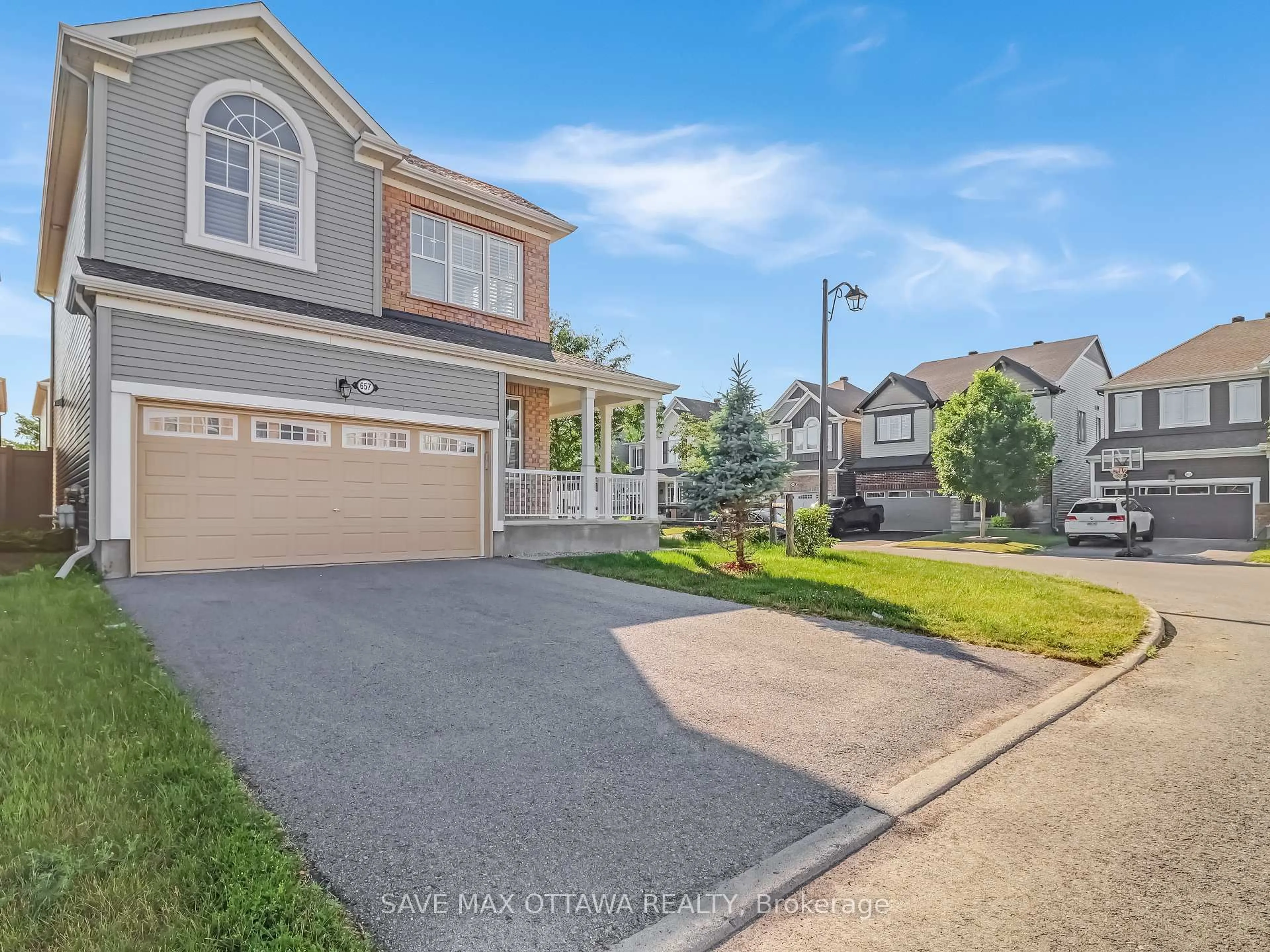 A pic from outside/outdoor area/front of a property/back of a property/a pic from drone, street for 657 Broad Cove Cres, Ottawa Ontario K2J 6H6