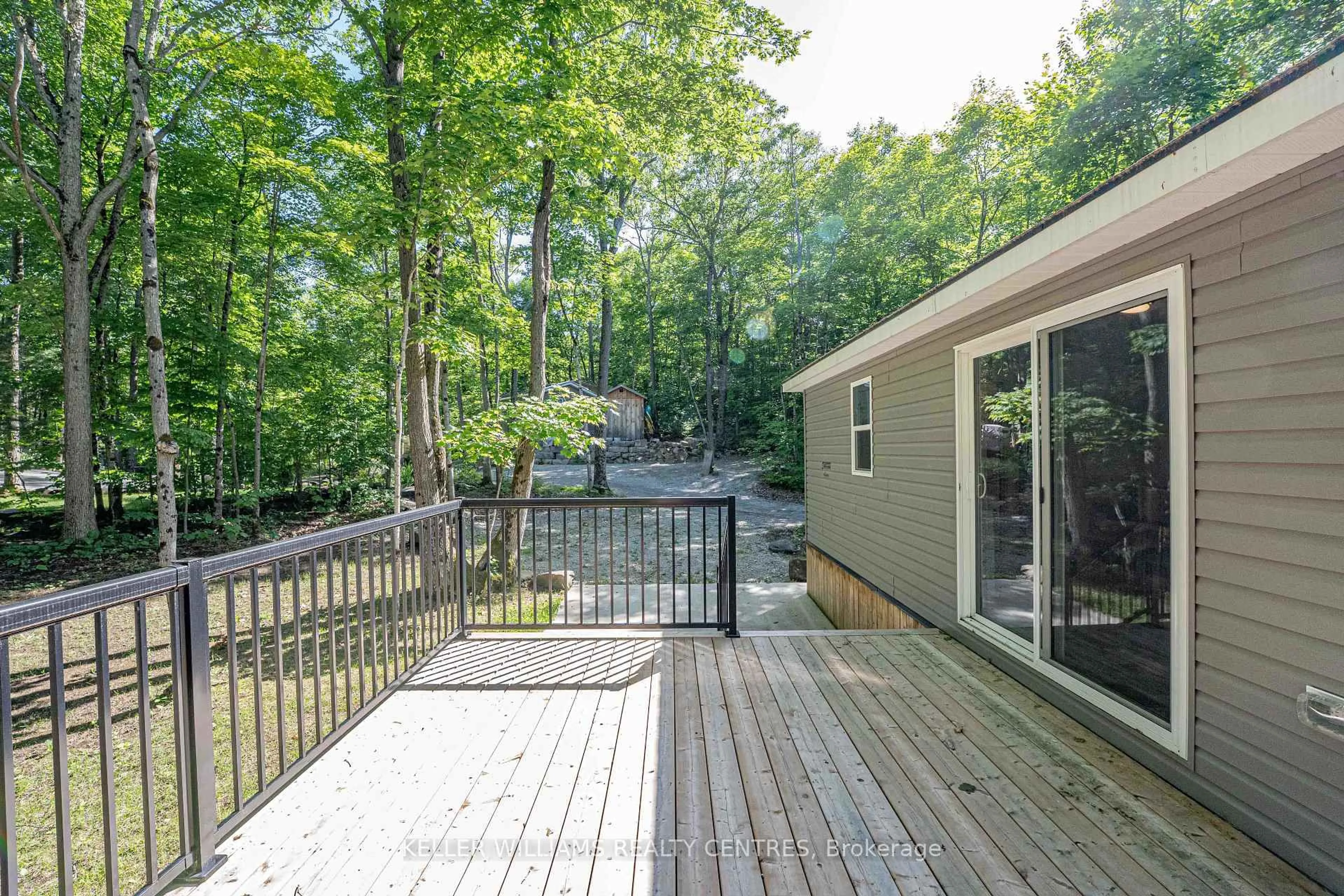 Patio, forest/trees view for 202 HIDDEN GLEN Rd #Unit #4, Georgian Bay Ontario L0K 1S0