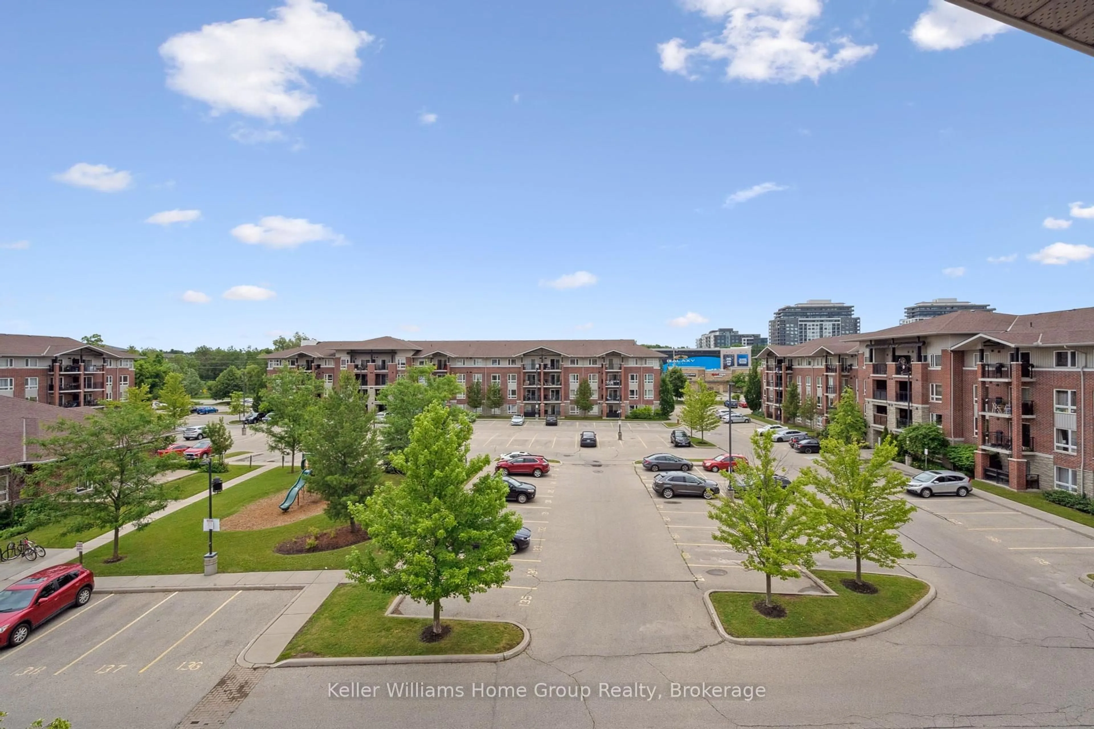A pic from outside/outdoor area/front of a property/back of a property/a pic from drone, city buildings view from balcony for 37 Goodwin Dr #411, Guelph Ontario N1L 0E6