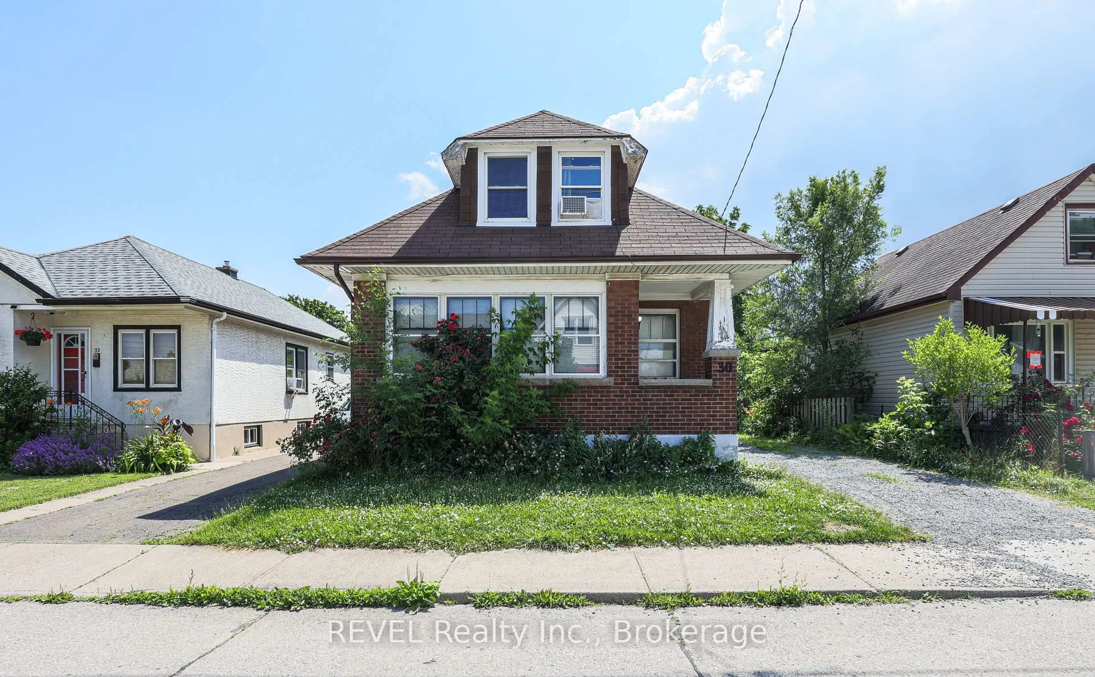 Home with brick exterior material, street for 30 Ormonde Ave, St. Catharines Ontario L2M 5P2