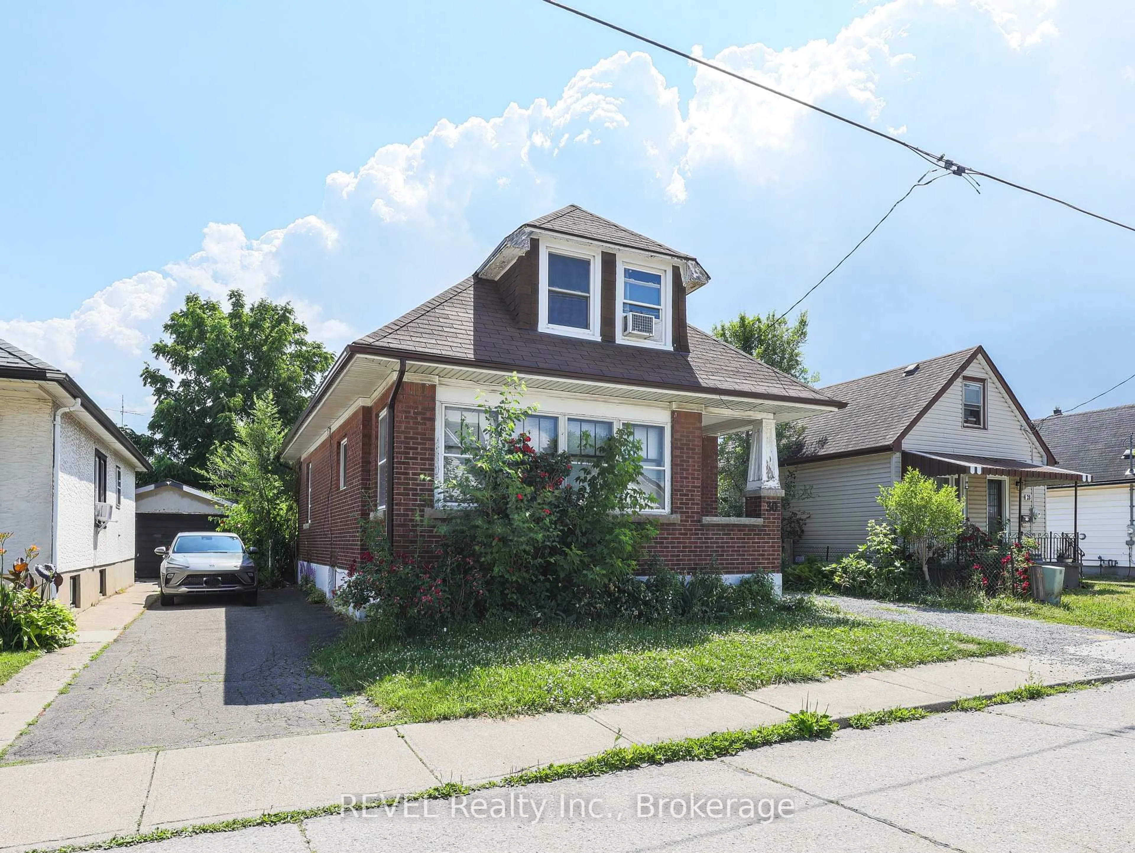 Home with brick exterior material, street for 30 Ormonde Ave, St. Catharines Ontario L2M 5P2