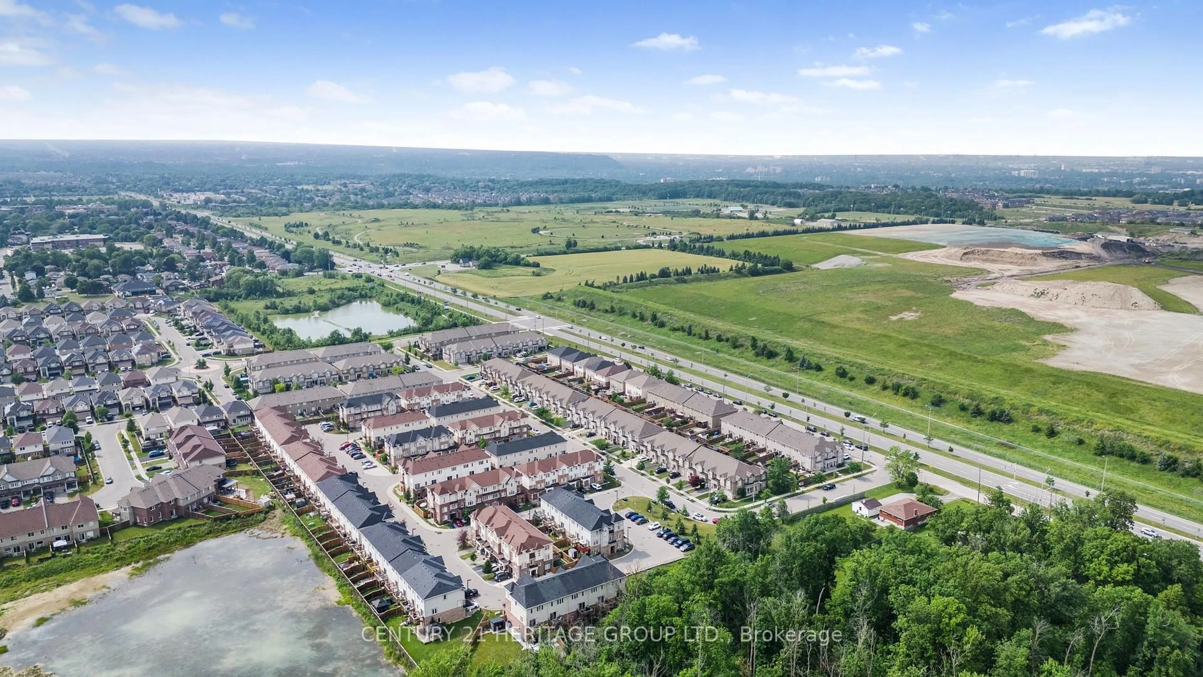 A pic from outside/outdoor area/front of a property/back of a property/a pic from drone, unknown for 71 Waterbridge St, Hamilton Ontario L8J 0G2
