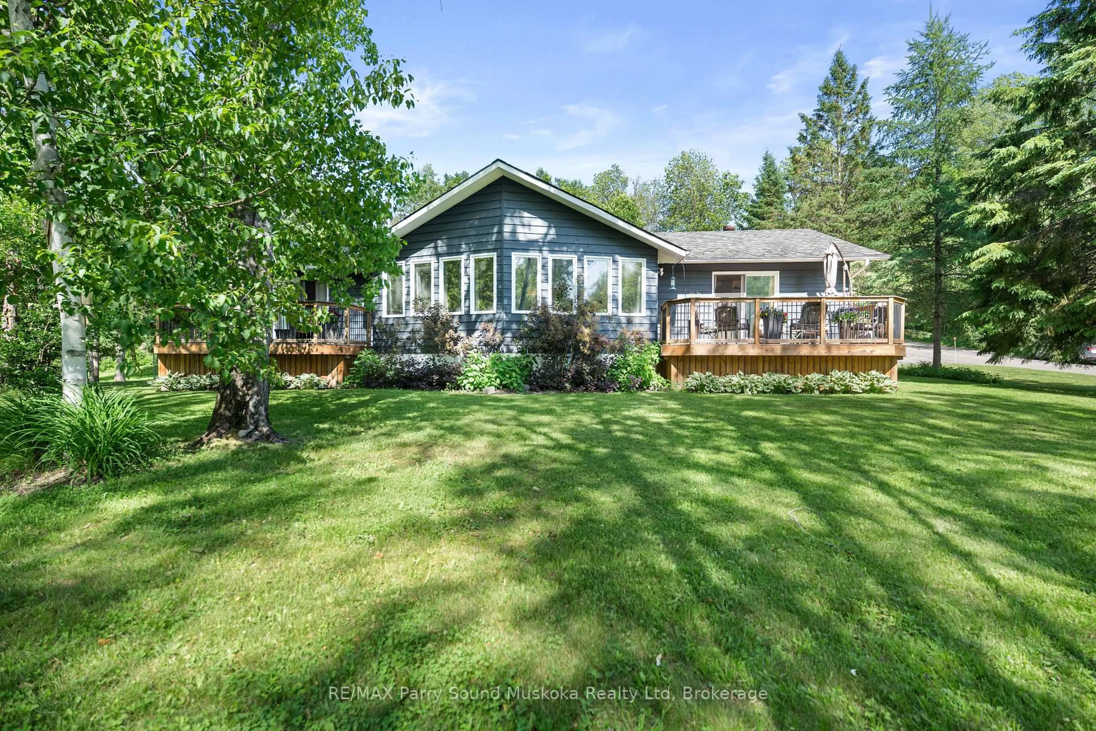 A pic from outside/outdoor area/front of a property/back of a property/a pic from drone, water/lake/river/ocean view for 36 Maple St, Seguin Ontario P0C 1J0