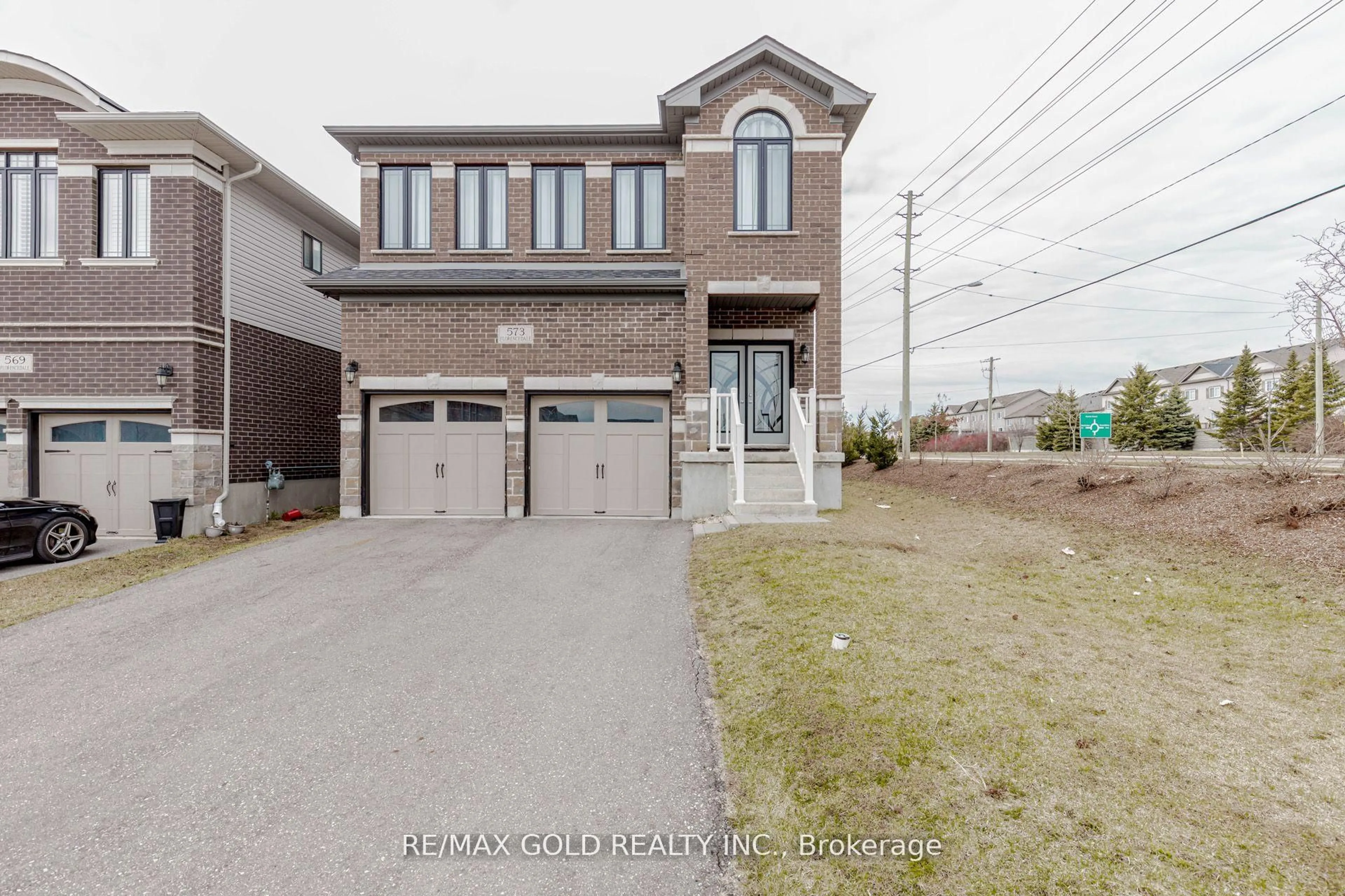 Home with brick exterior material, street for 573 Florencedale Cres, Kitchener Ontario N2R 0N3