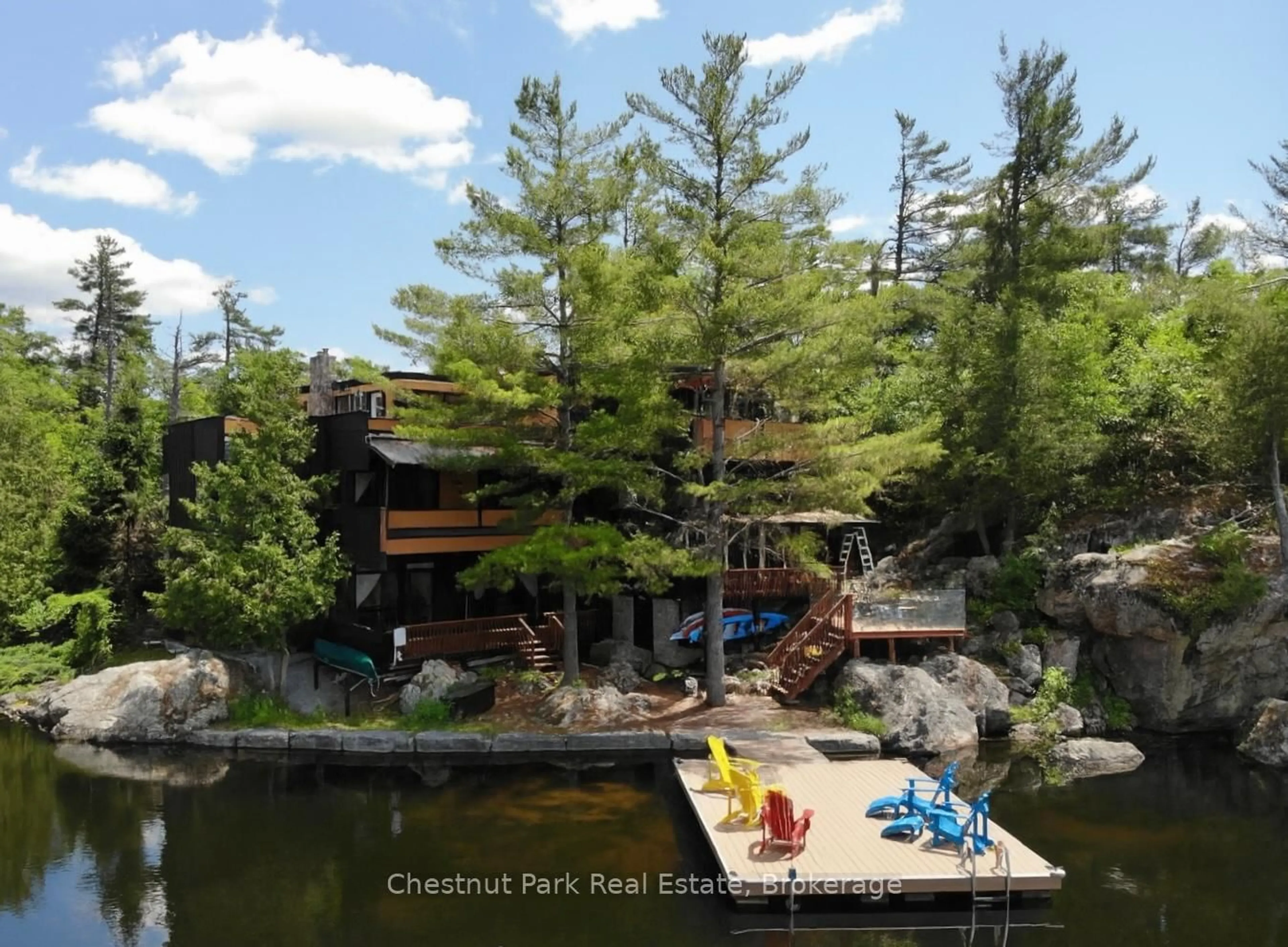 A pic from outside/outdoor area/front of a property/back of a property/a pic from drone, water/lake/river/ocean view for 110 FIRE ROUTE 19 Rte, Trent Lakes Ontario K0L 1J0