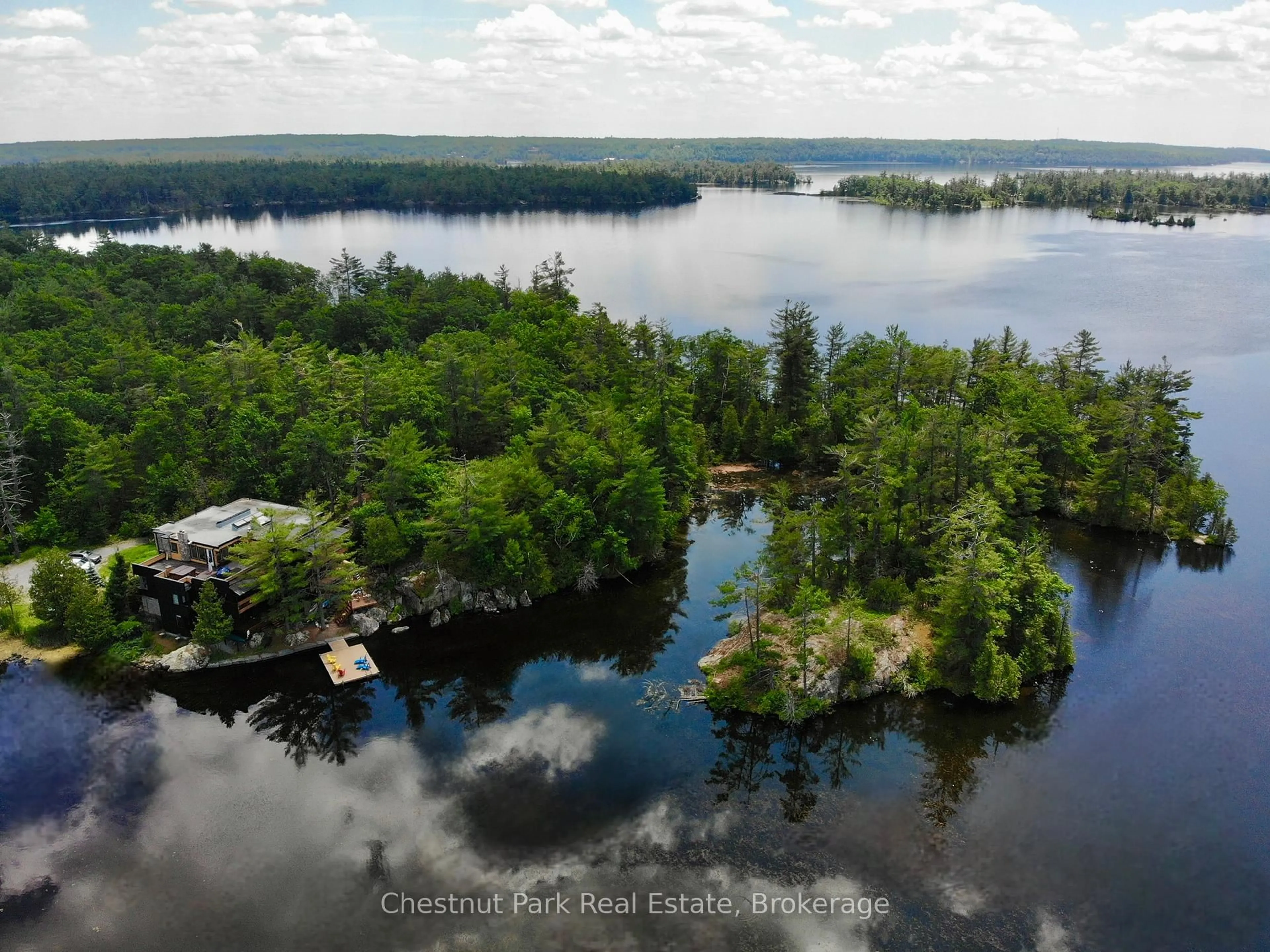 A pic from outside/outdoor area/front of a property/back of a property/a pic from drone, water/lake/river/ocean view for 110 FIRE ROUTE 19 Rte, Trent Lakes Ontario K0L 1J0