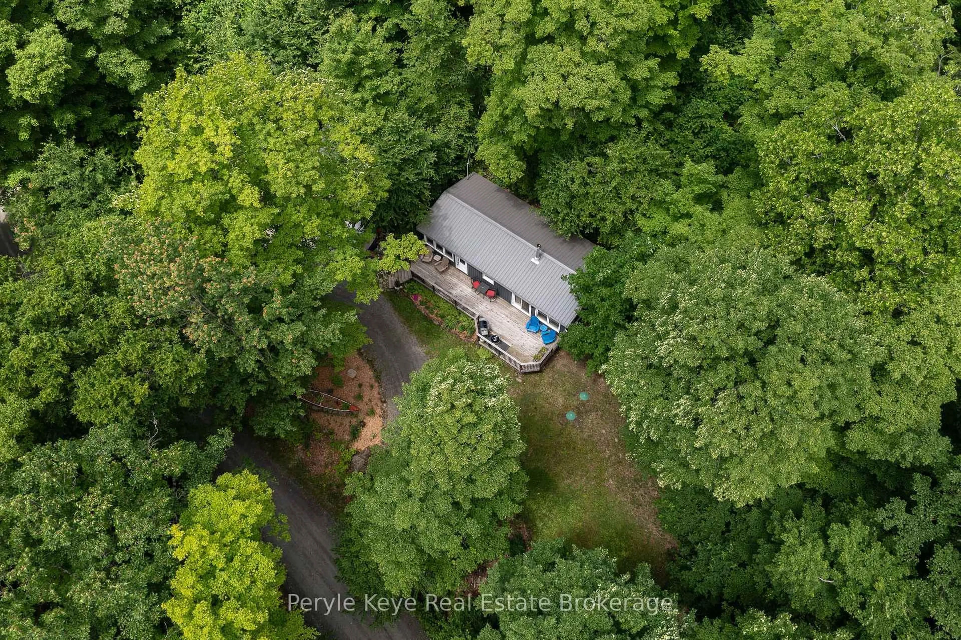 A pic from outside/outdoor area/front of a property/back of a property/a pic from drone, forest/trees view for 6 & 8 Brennan Circ, Huntsville Ontario P1L 2J2