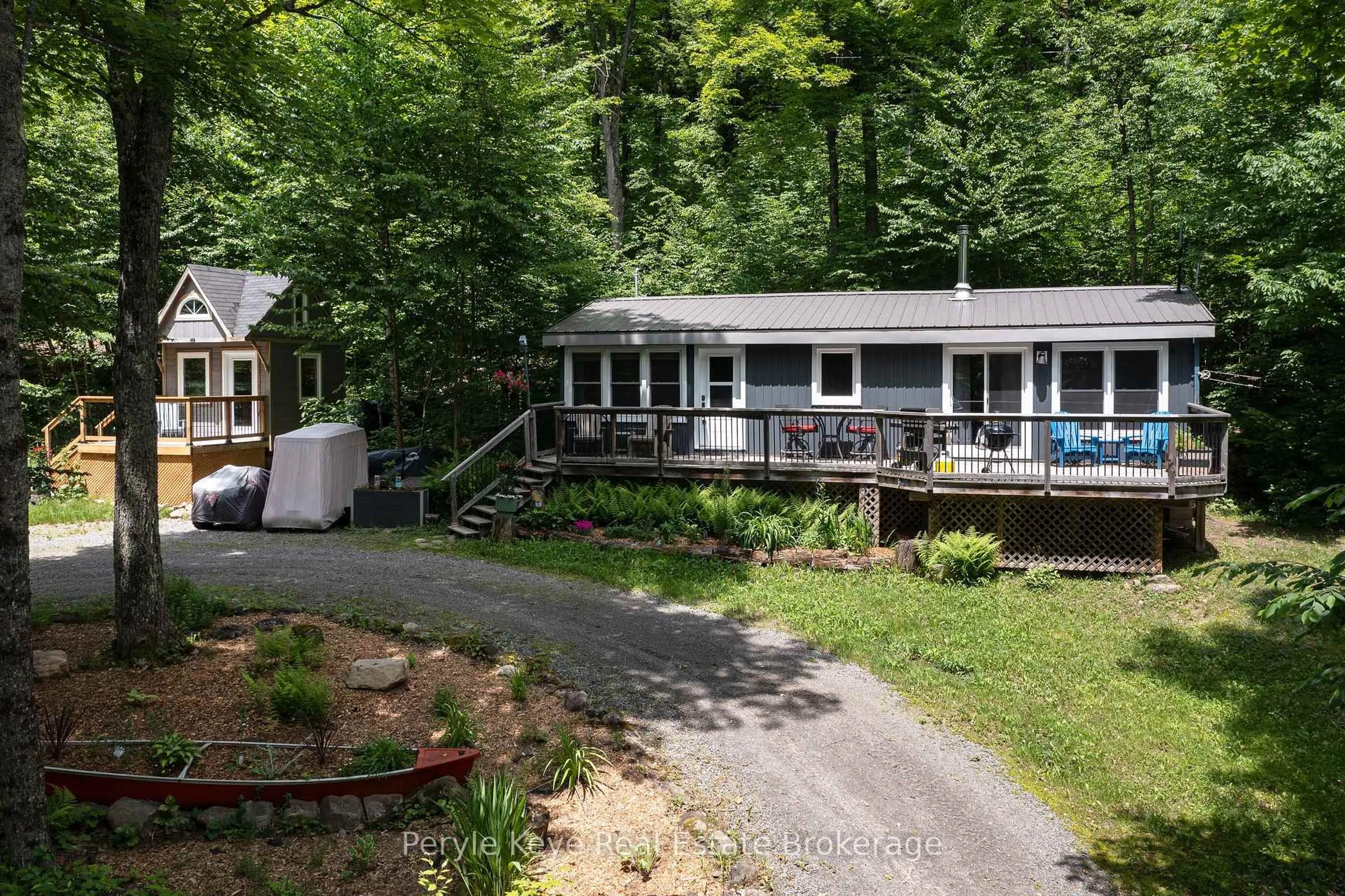 A pic from outside/outdoor area/front of a property/back of a property/a pic from drone, water/lake/river/ocean view for 6 & 8 Brennan Circ, Huntsville Ontario P1L 2J2