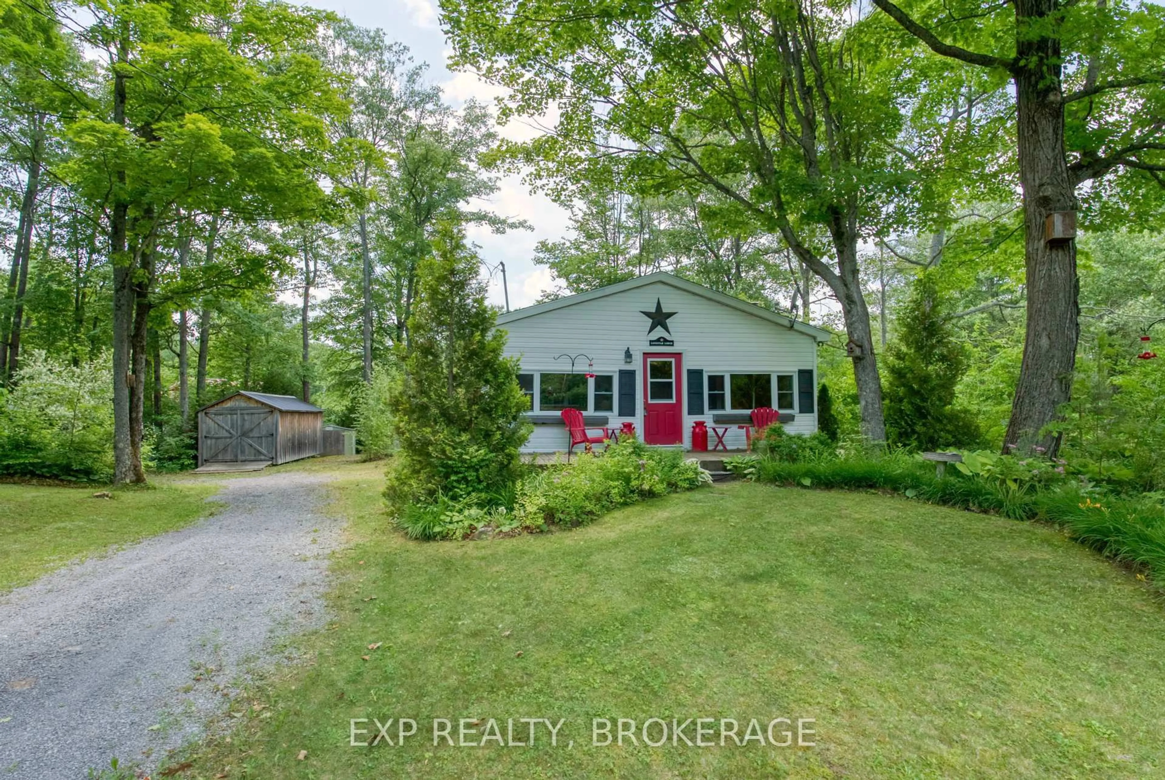 A pic from outside/outdoor area/front of a property/back of a property/a pic from drone, street for 1036 Lakeshore Rd, Arden Ontario K0H 1B0