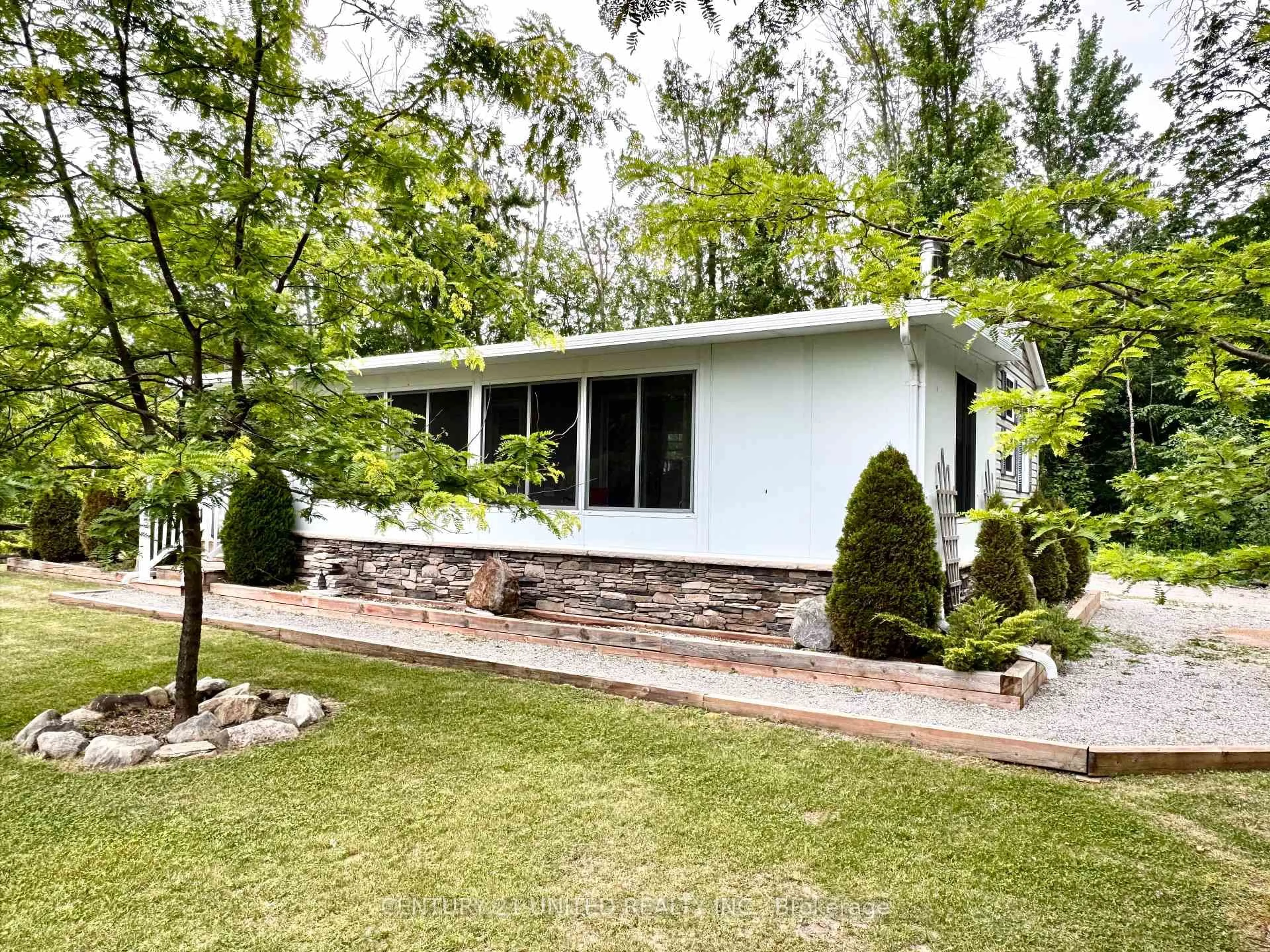Home with vinyl exterior material, street for 88 Rollie's Bay Rd, Curve Lake First Nation 35 Ontario K0L 1R0