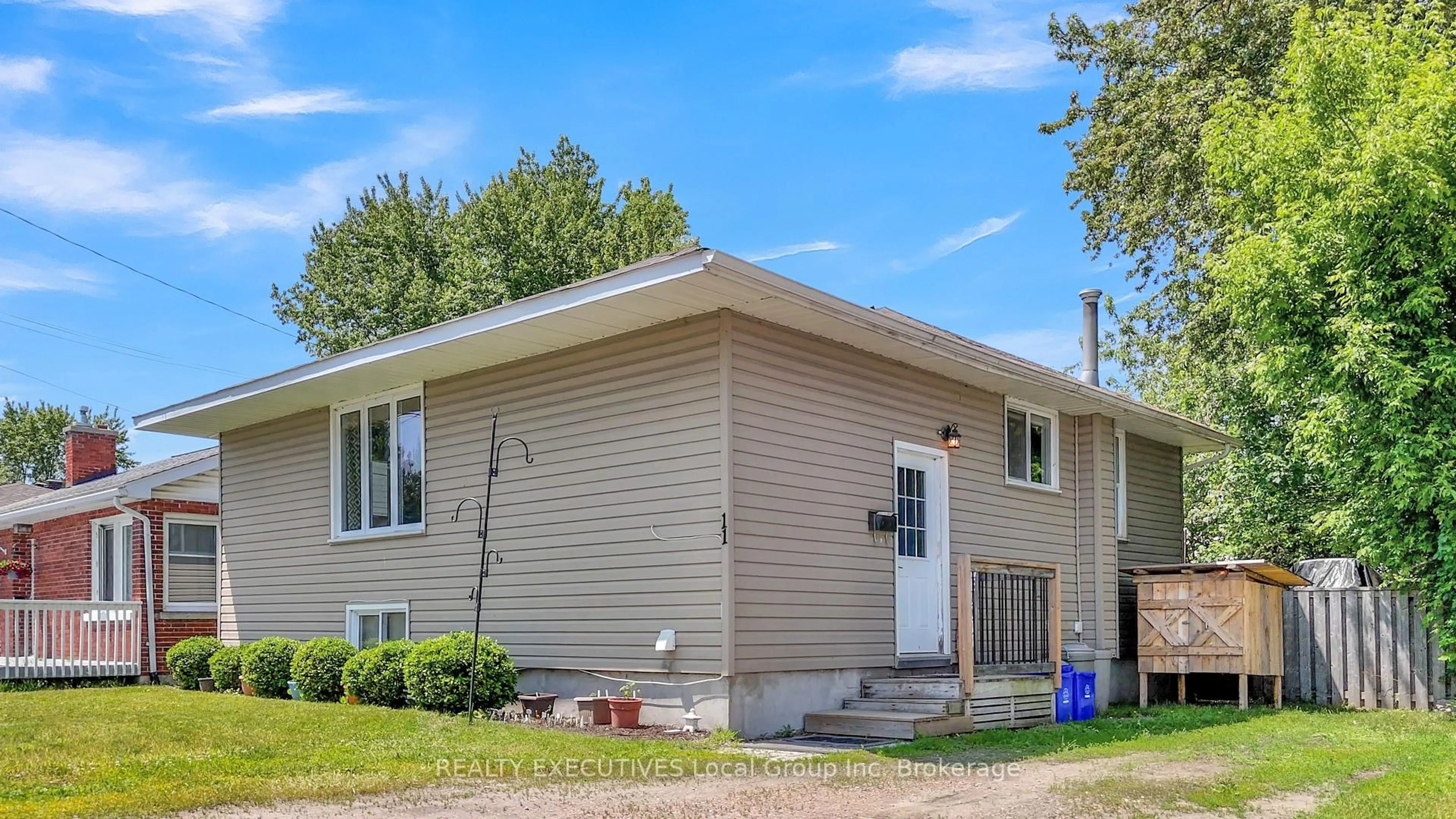 Home with vinyl exterior material, street for 11 Gertrude St, North Bay Ontario P1A 1J2