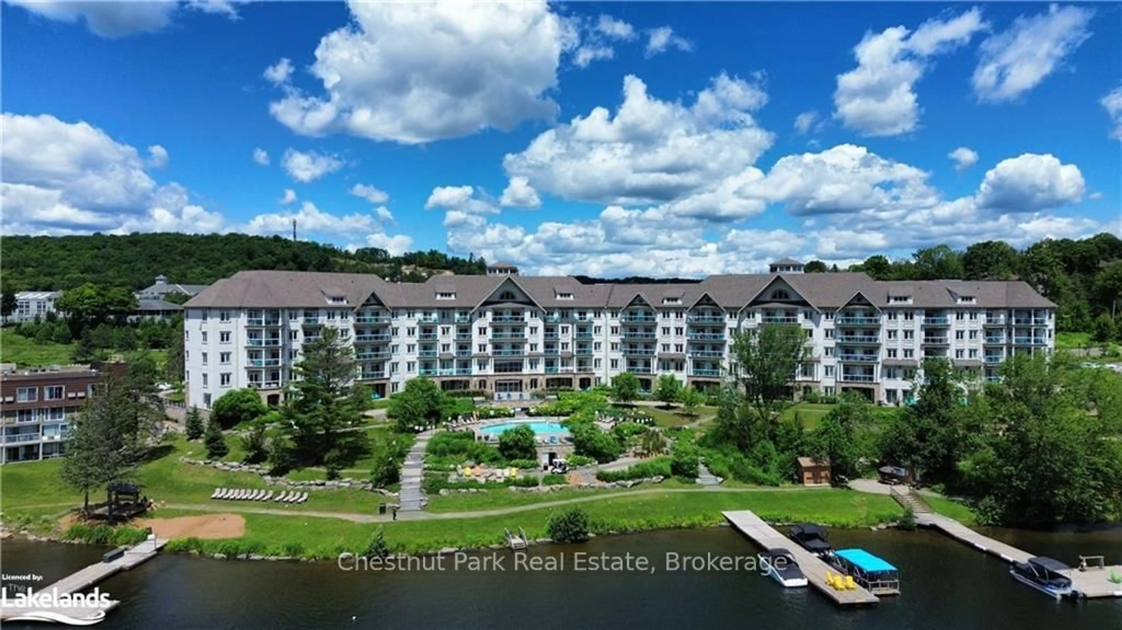 A pic from outside/outdoor area/front of a property/back of a property/a pic from drone, water/lake/river/ocean view for 25 Pen Lake Point Rd #330, Huntsville Ontario P1H 1A9