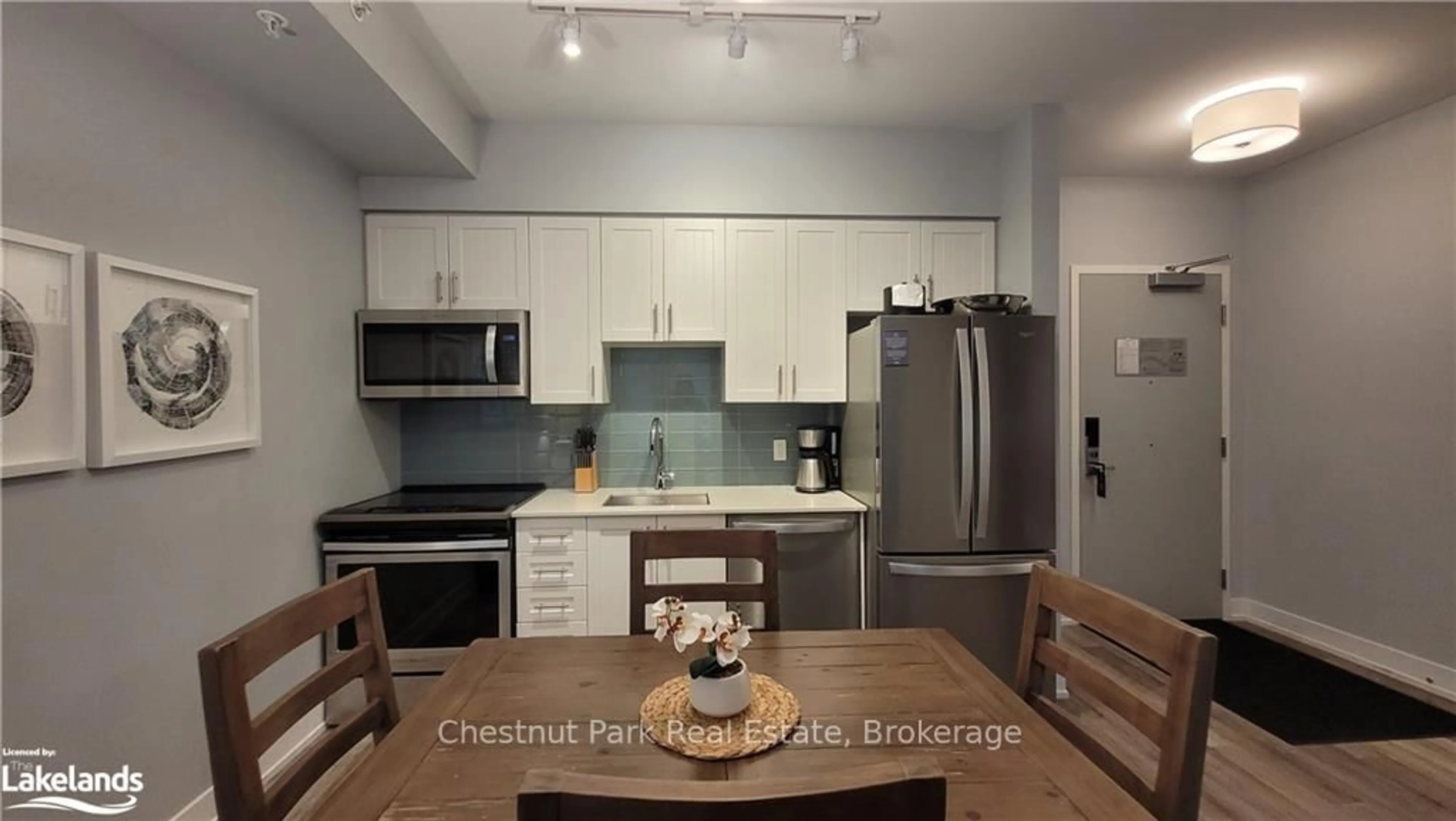 Open concept kitchen, ceramic/tile floor for 25 Pen Lake Point Rd #330, Huntsville Ontario P1H 1A9