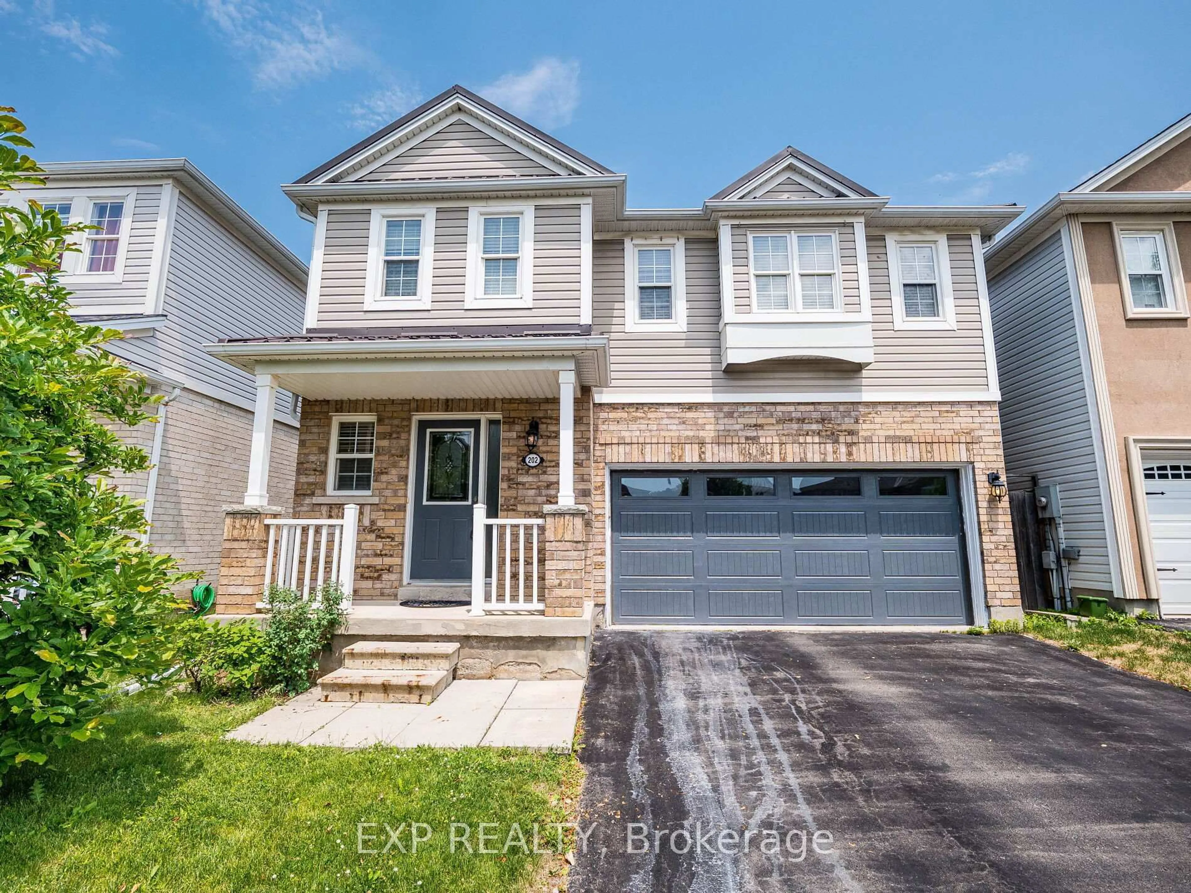 Home with brick exterior material, street for 202 Voyager Pass, Hamilton Ontario L0R 1C0