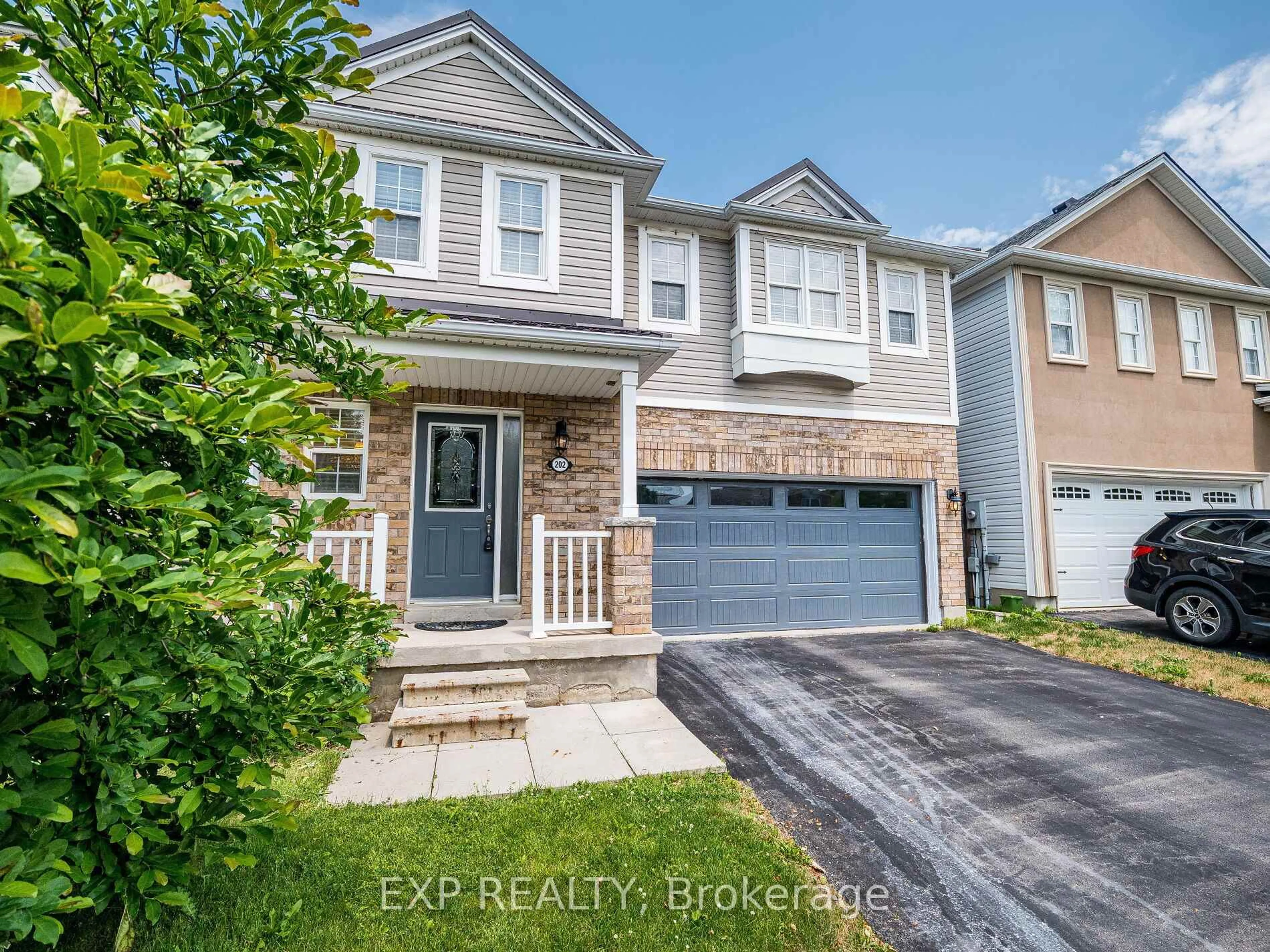 A pic from outside/outdoor area/front of a property/back of a property/a pic from drone, street for 202 Voyager Pass, Hamilton Ontario L0R 1C0