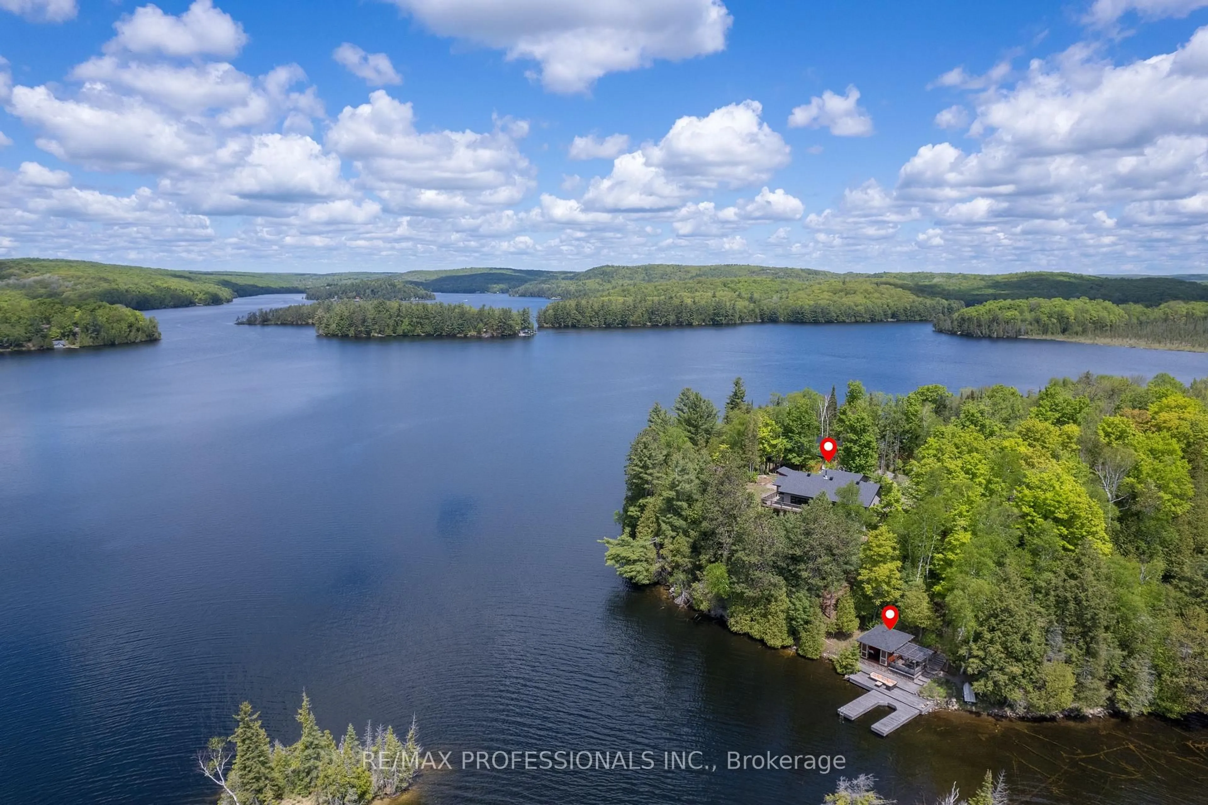 A pic from outside/outdoor area/front of a property/back of a property/a pic from drone, water/lake/river/ocean view for 1433 Abrams Rd, Highlands East Ontario K0L 1C0