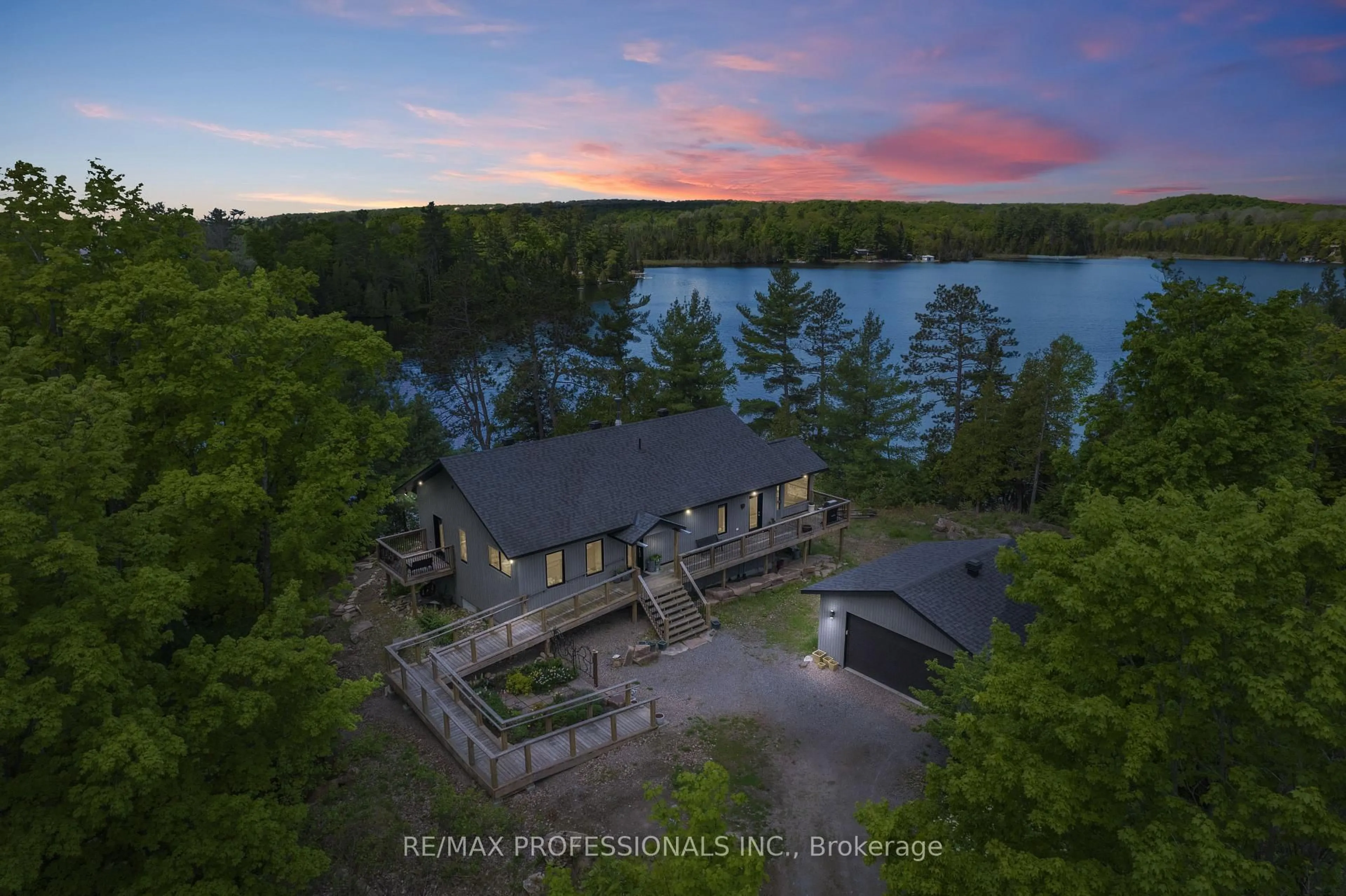A pic from outside/outdoor area/front of a property/back of a property/a pic from drone, water/lake/river/ocean view for 1433 Abrams Rd, Highlands East Ontario K0L 1C0