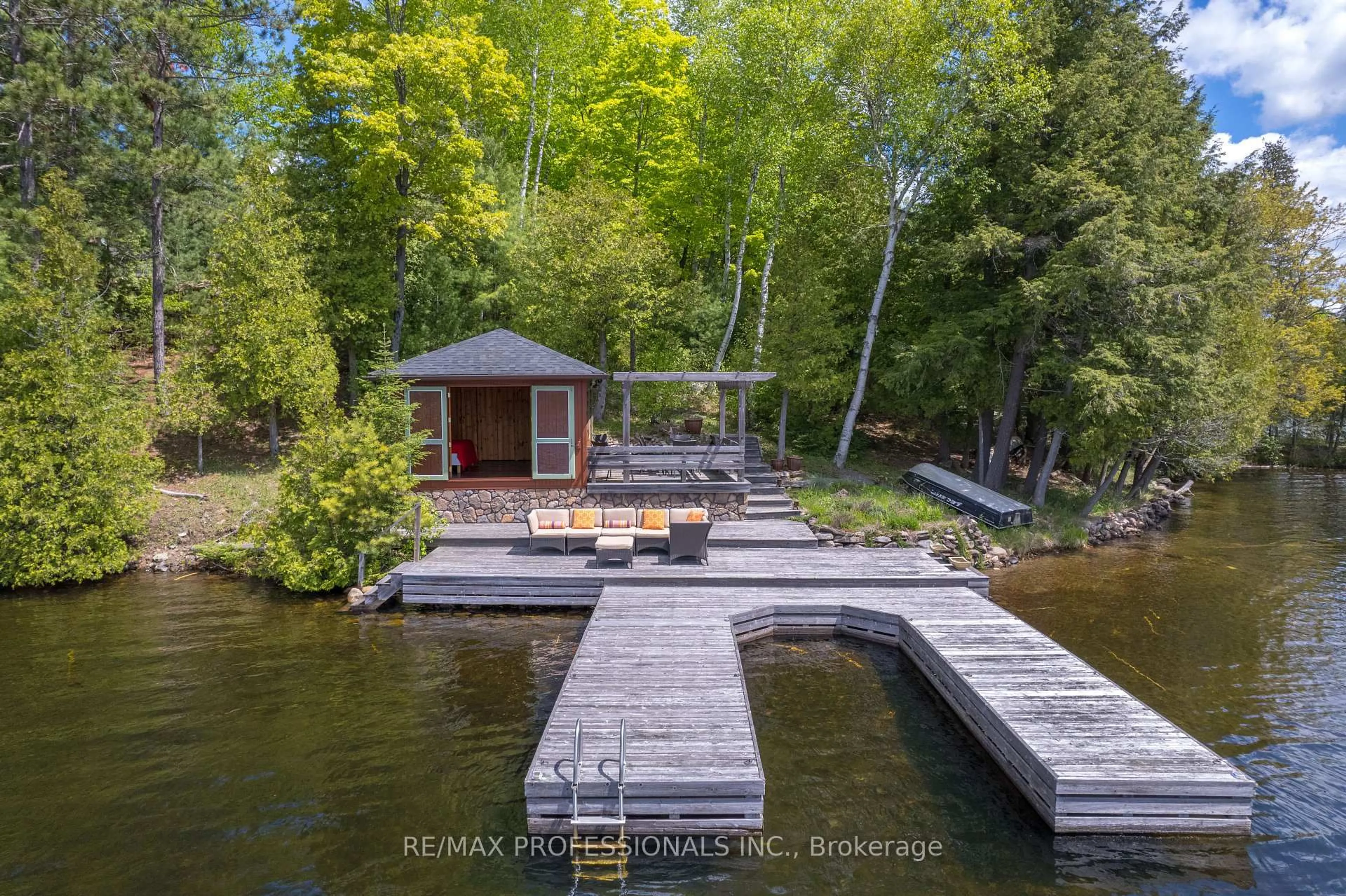 A pic from outside/outdoor area/front of a property/back of a property/a pic from drone, water/lake/river/ocean view for 1433 Abrams Rd, Highlands East Ontario K0L 1C0