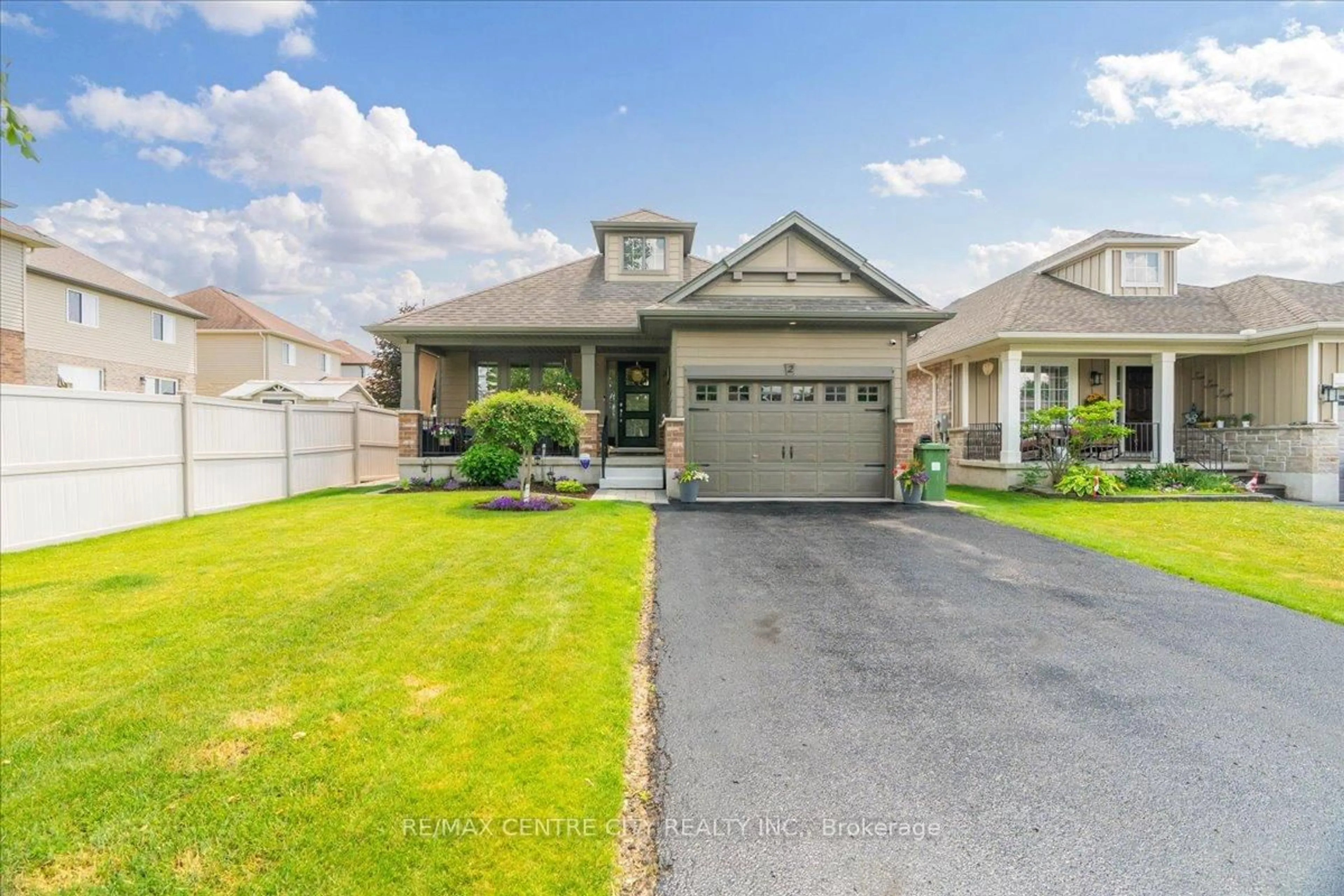 Home with vinyl exterior material, street for 2 Cherry Blossom Lane, St. Thomas Ontario N5R 1L2
