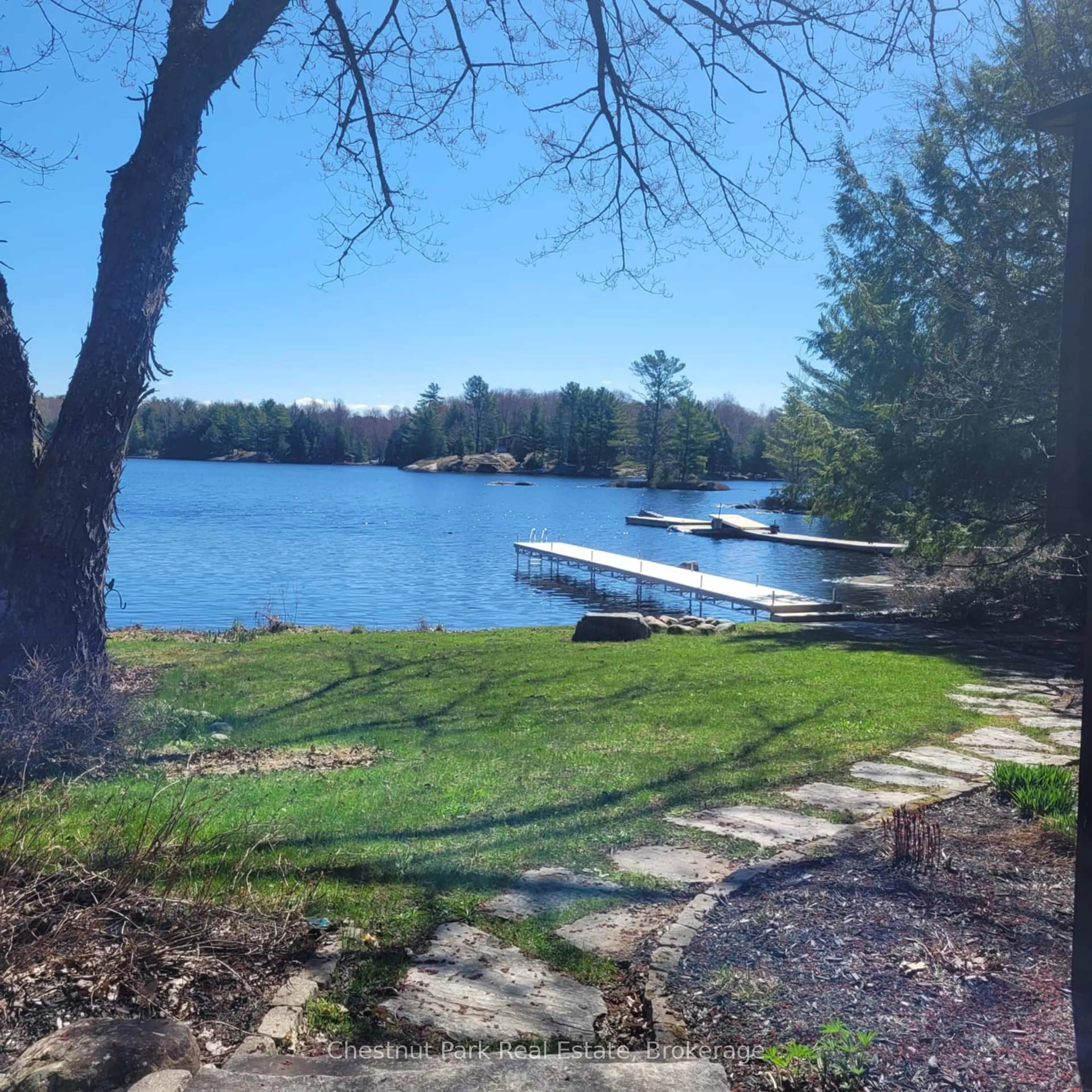 A pic from outside/outdoor area/front of a property/back of a property/a pic from drone, water/lake/river/ocean view for 1183 Dickie Lake Rd, Lake of Bays Ontario P0B 1A0