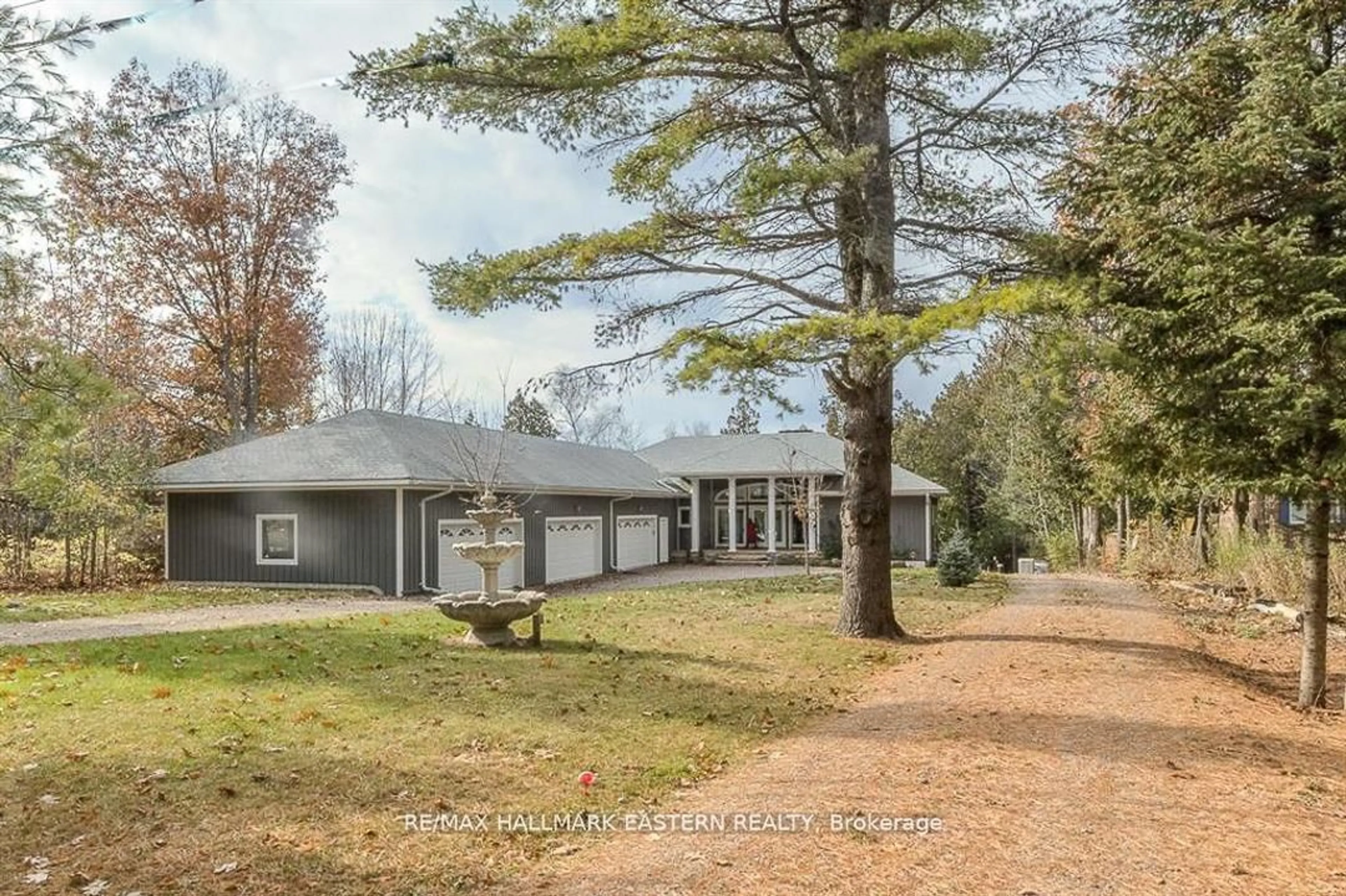 A pic from outside/outdoor area/front of a property/back of a property/a pic from drone, unknown for 308 Indian Point Rd, Kawartha Lakes Ontario K0M 1K0