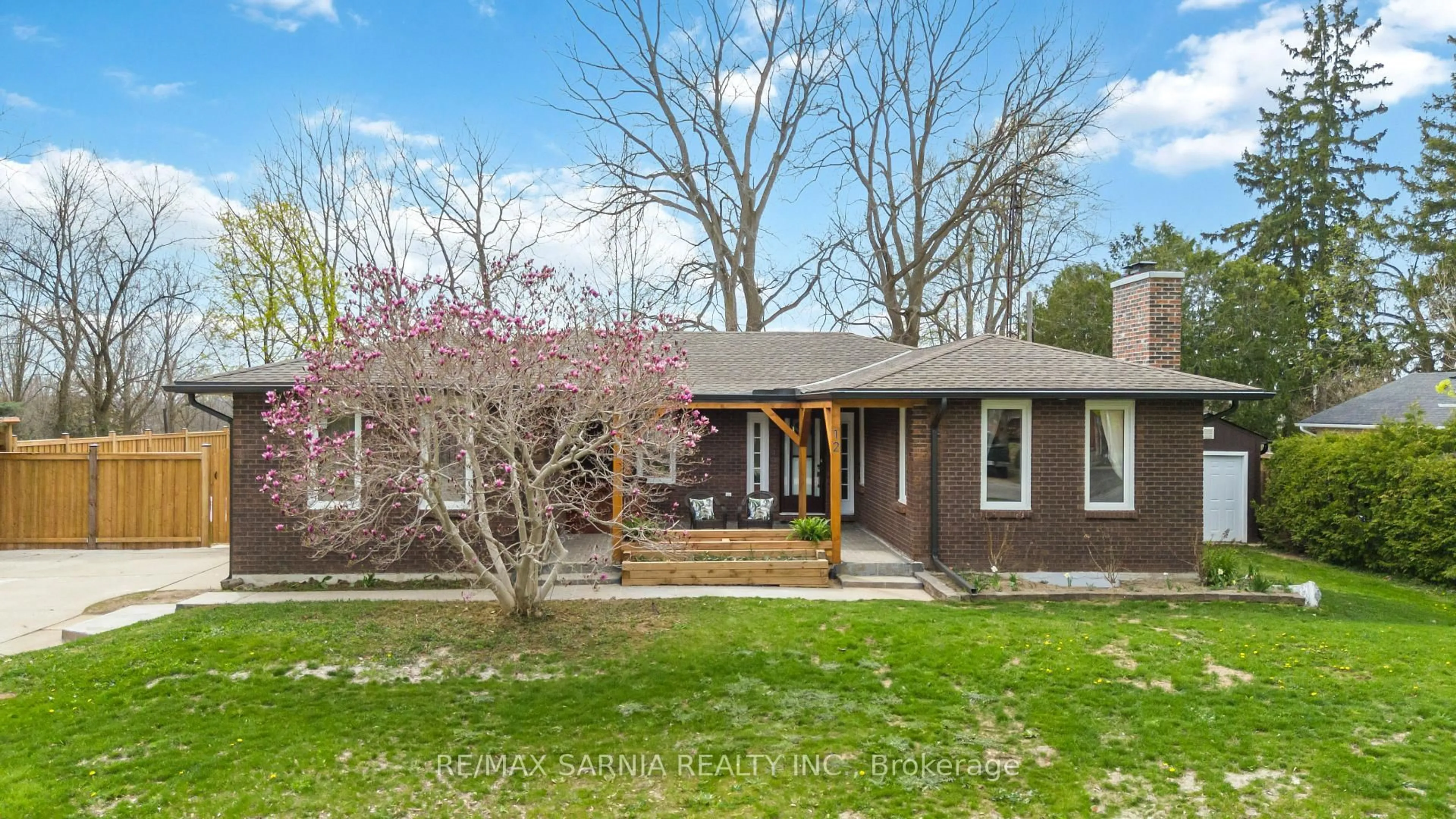 Home with brick exterior material, street for 12 Sunset Ave, Warwick Ontario N0M 1S0