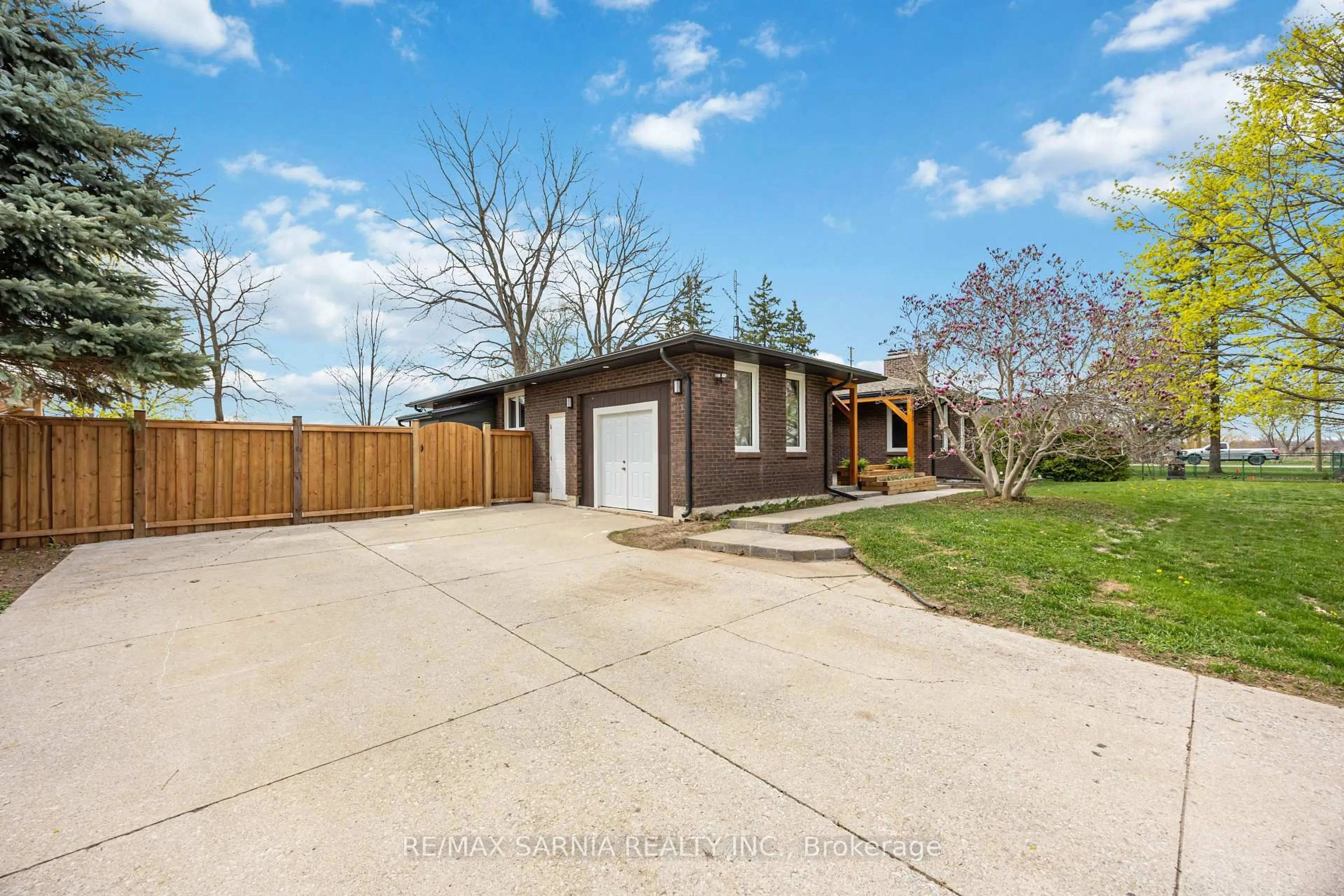 A pic from outside/outdoor area/front of a property/back of a property/a pic from drone, street for 12 Sunset Ave, Warwick Ontario N0M 1S0