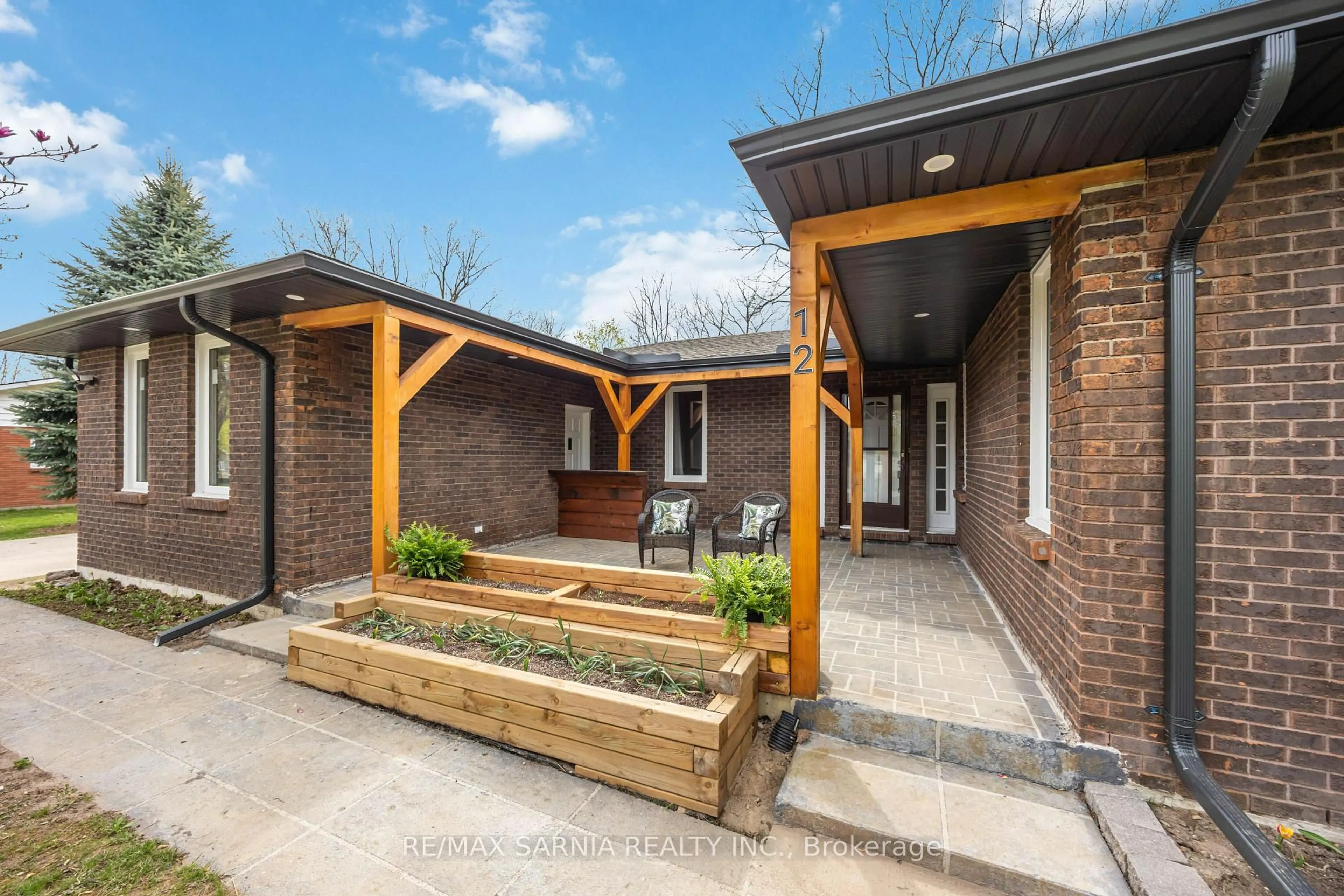 Home with brick exterior material, street for 12 Sunset Ave, Warwick Ontario N0M 1S0