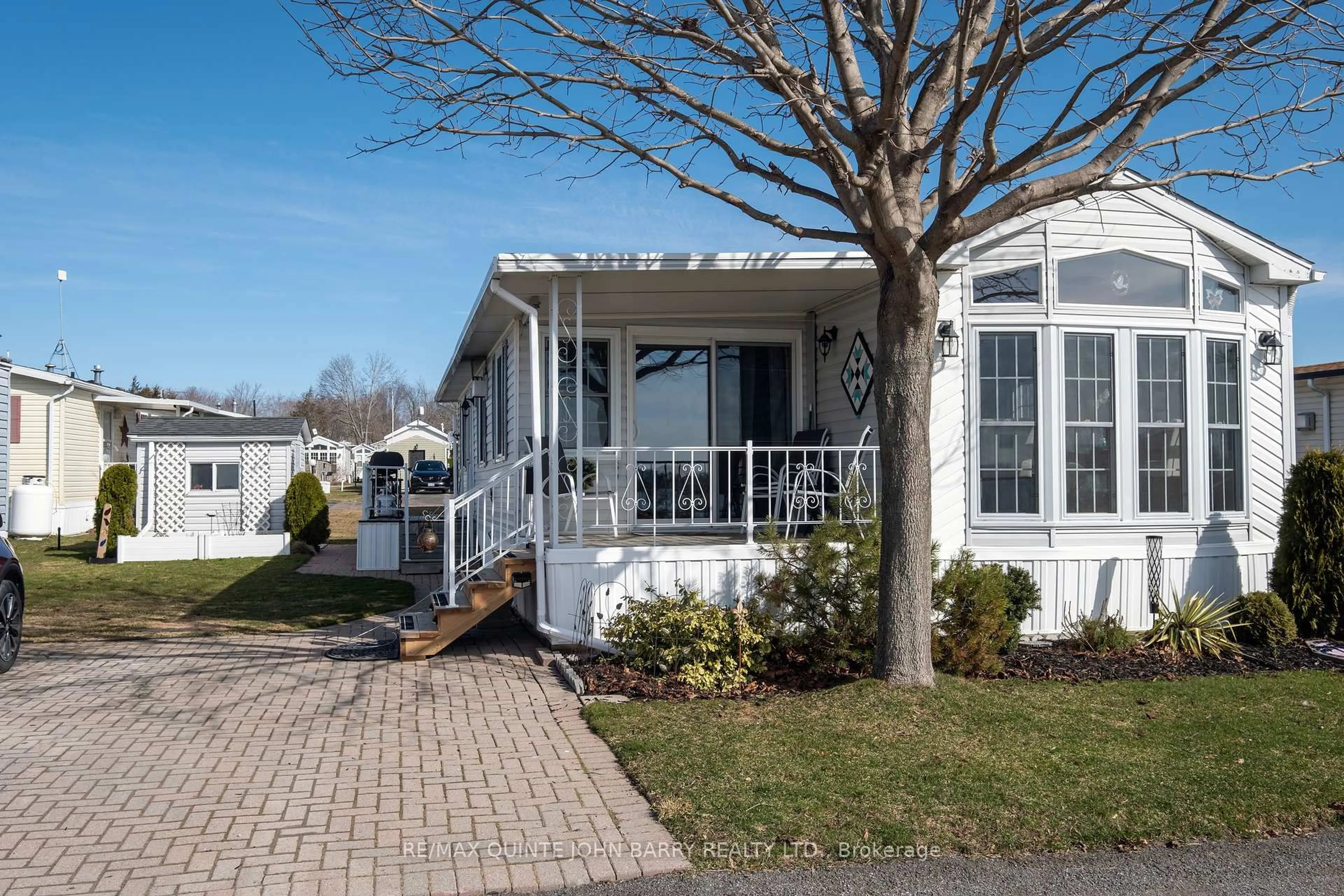 Home with vinyl exterior material, street for 153 County Road 27, Prince Edward County Ontario K0K 1T0