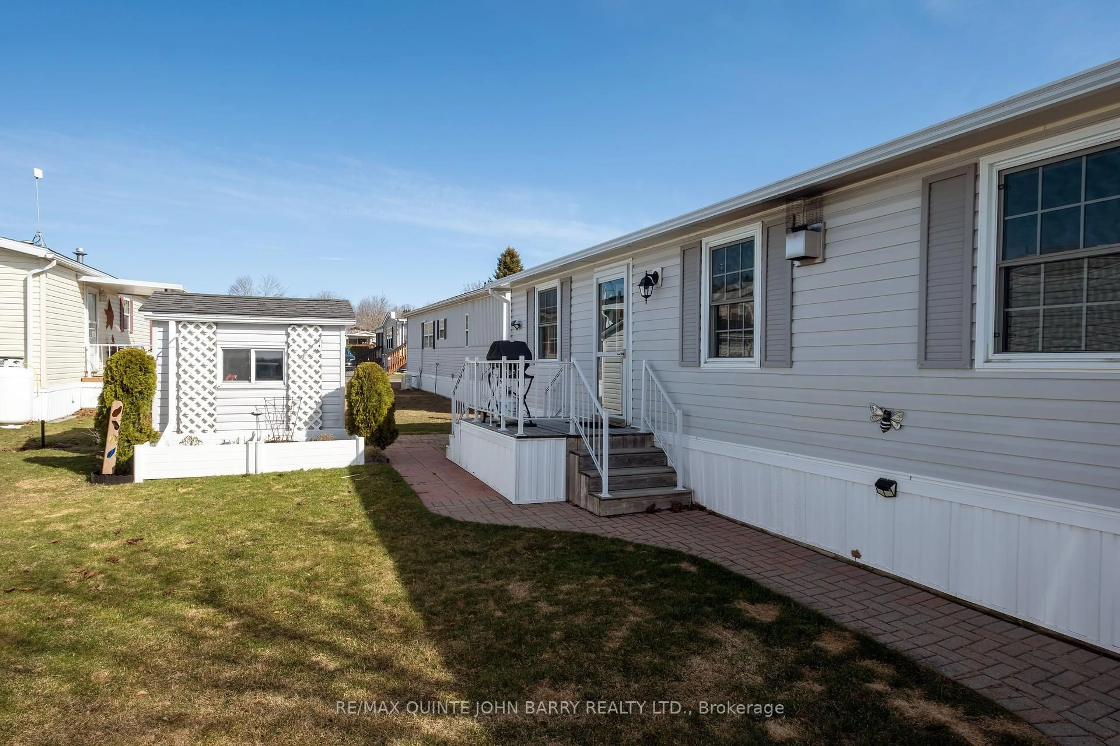 Home with vinyl exterior material, street for 153 County Road 27, Prince Edward County Ontario K0K 1T0