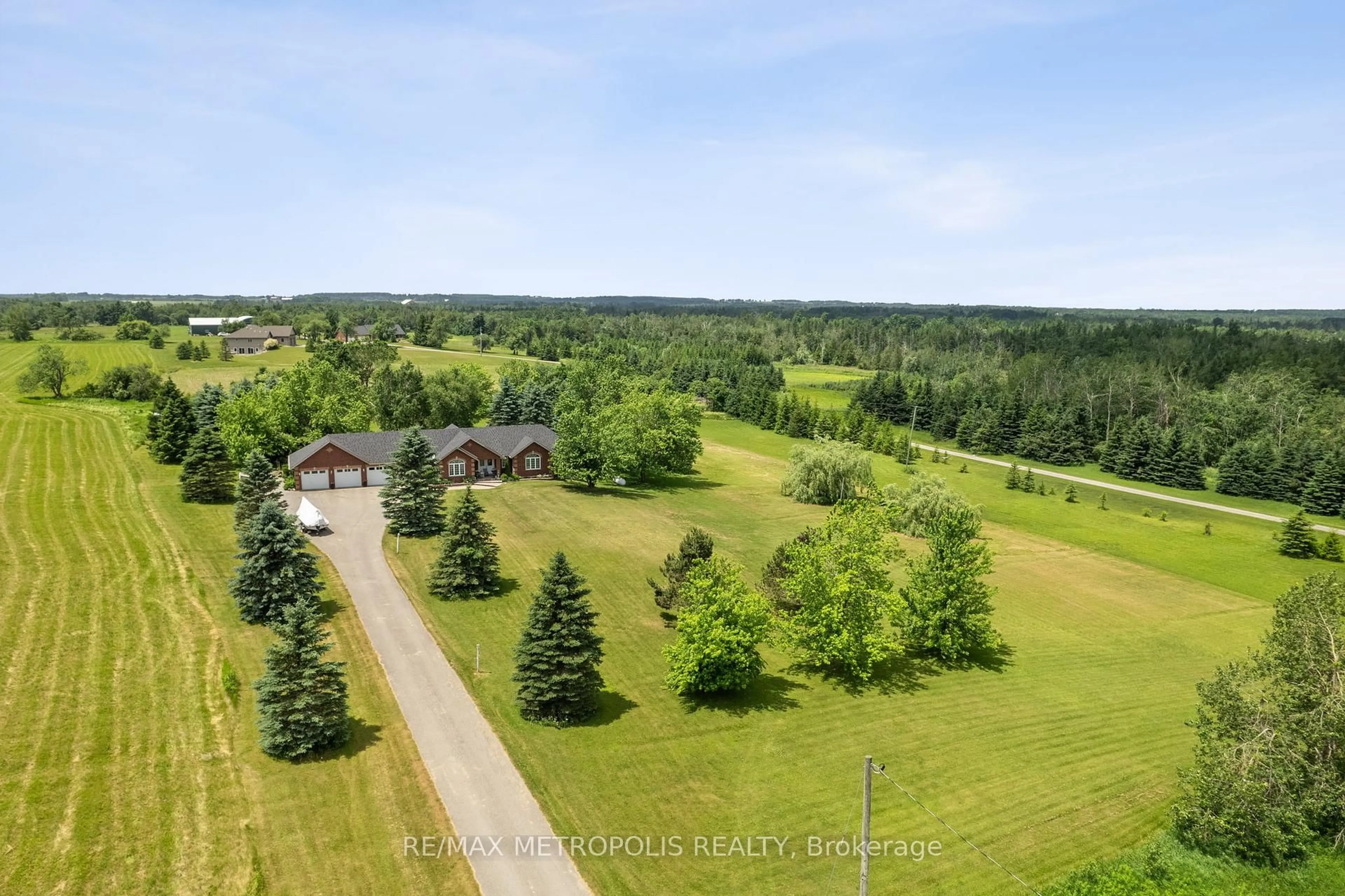 A pic from outside/outdoor area/front of a property/back of a property/a pic from drone, forest/trees view for 595034 Blind Line, Mono Ontario L9W 5N4