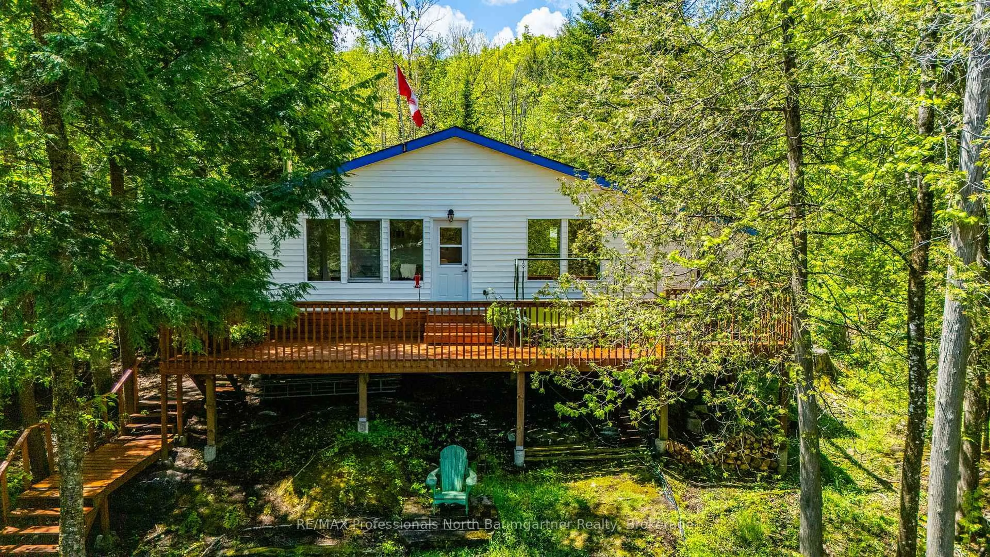 A pic from outside/outdoor area/front of a property/back of a property/a pic from drone, water/lake/river/ocean view for 1210 Twist Lane, Highlands East Ontario K0M 1X0