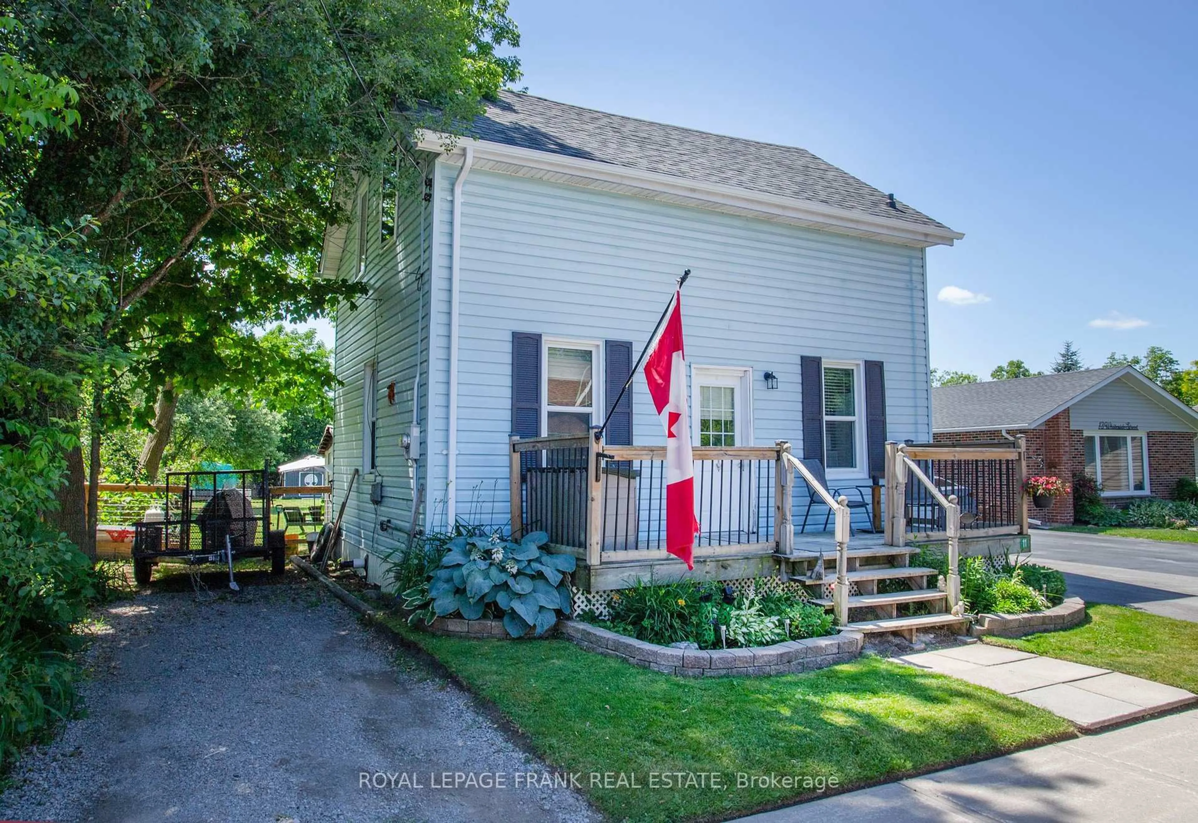 A pic from outside/outdoor area/front of a property/back of a property/a pic from drone, street for 11 Whiteside St, Kawartha Lakes Ontario K0M 2C0