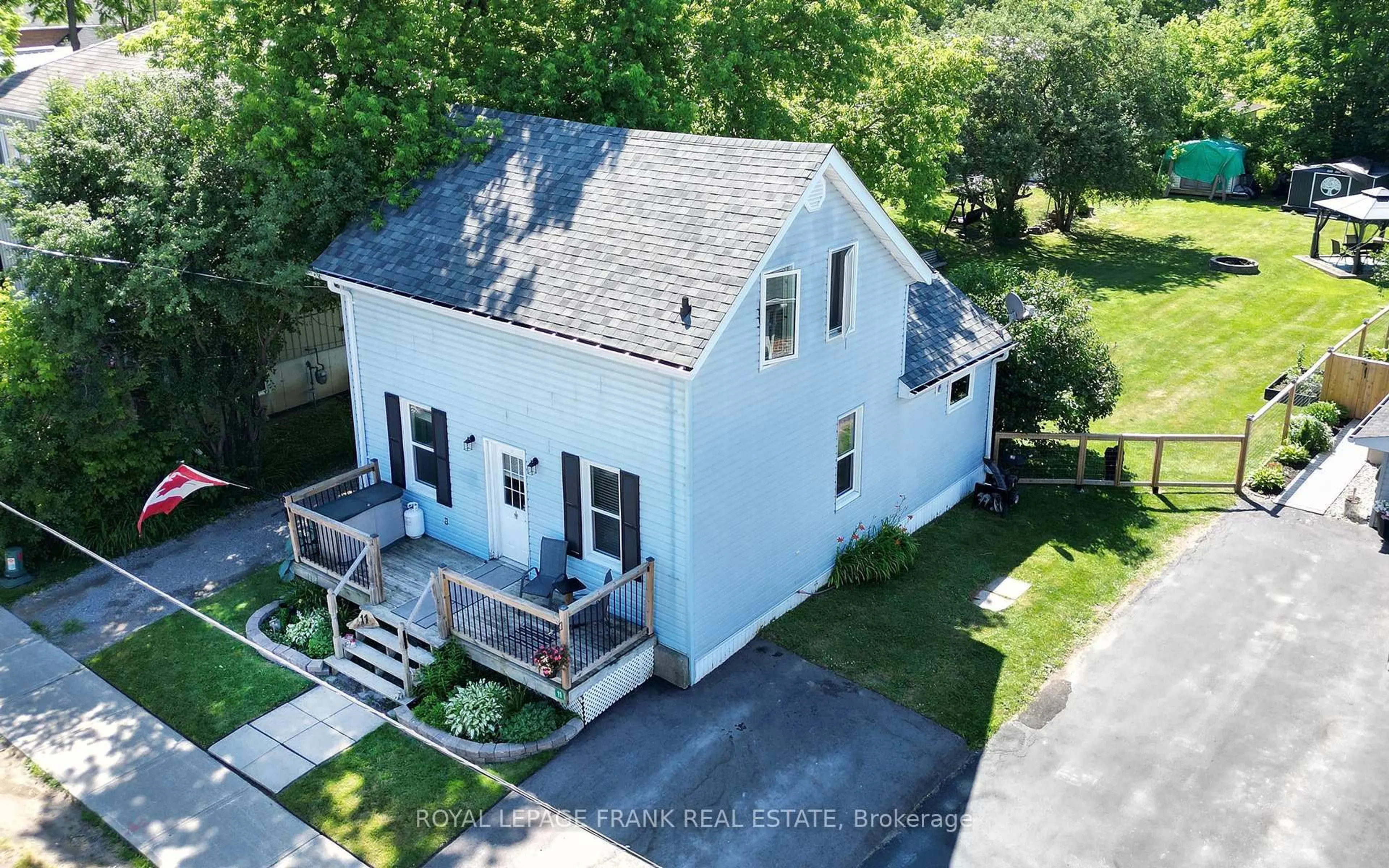A pic from outside/outdoor area/front of a property/back of a property/a pic from drone, street for 11 Whiteside St, Kawartha Lakes Ontario K0M 2C0