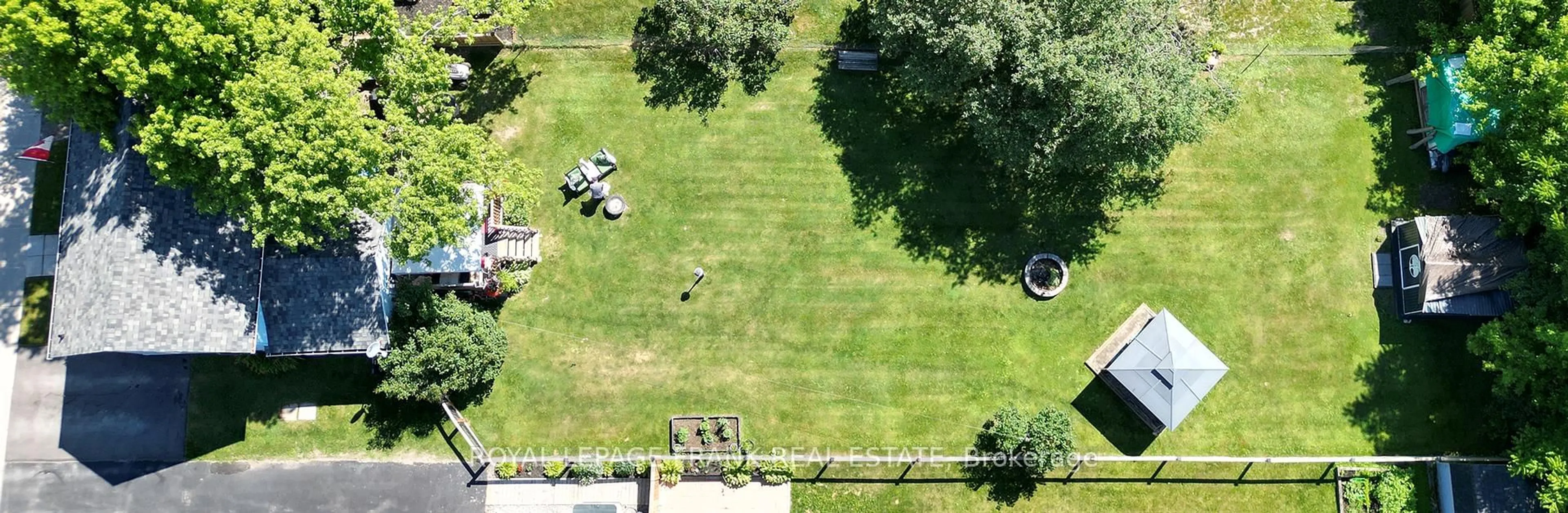 A pic from outside/outdoor area/front of a property/back of a property/a pic from drone, unknown for 11 Whiteside St, Kawartha Lakes Ontario K0M 2C0