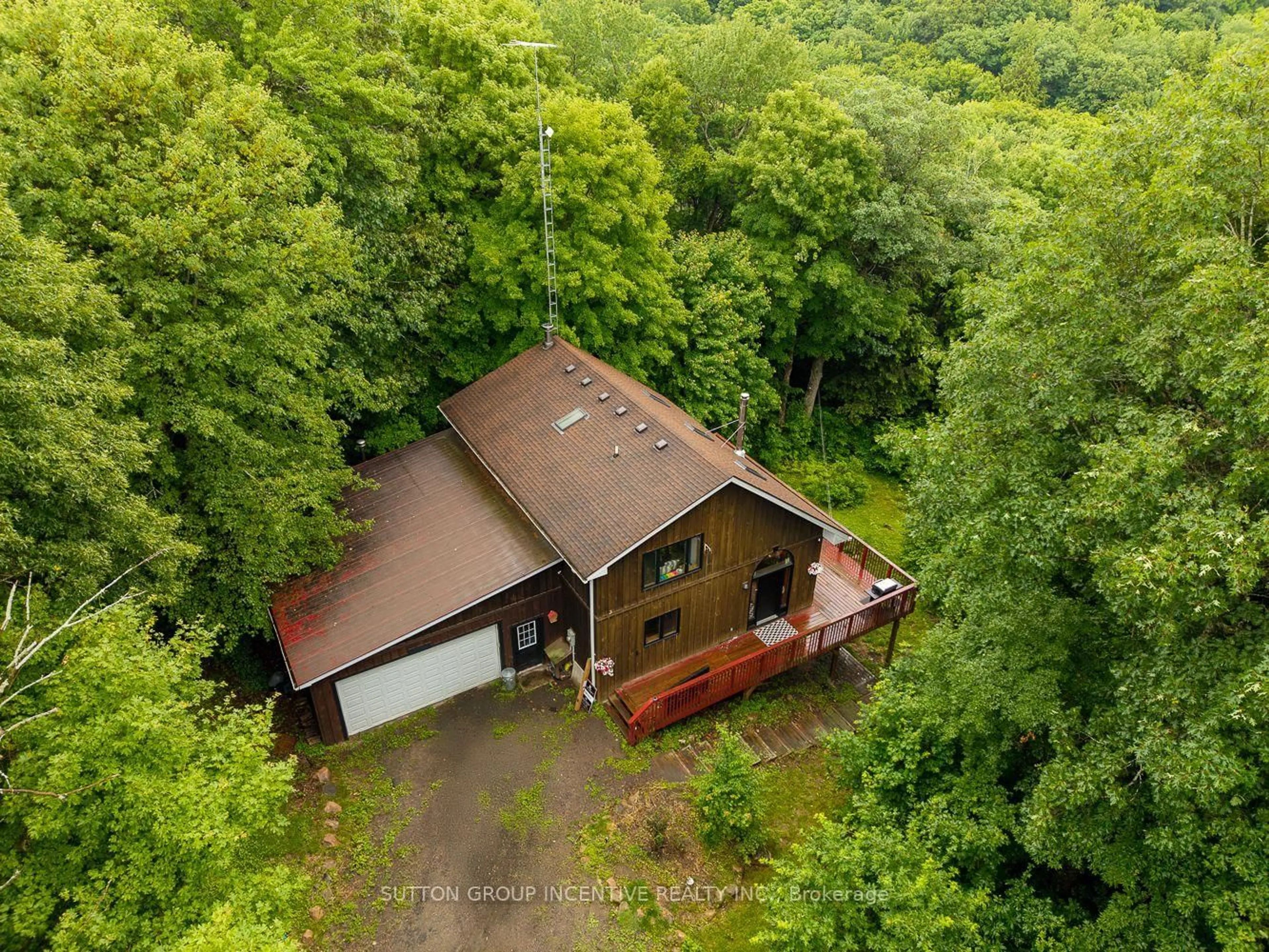 A pic from outside/outdoor area/front of a property/back of a property/a pic from drone, forest/trees view for 806 CLEARWATER LAKE Rd, Huntsville Ontario P0B 1L0