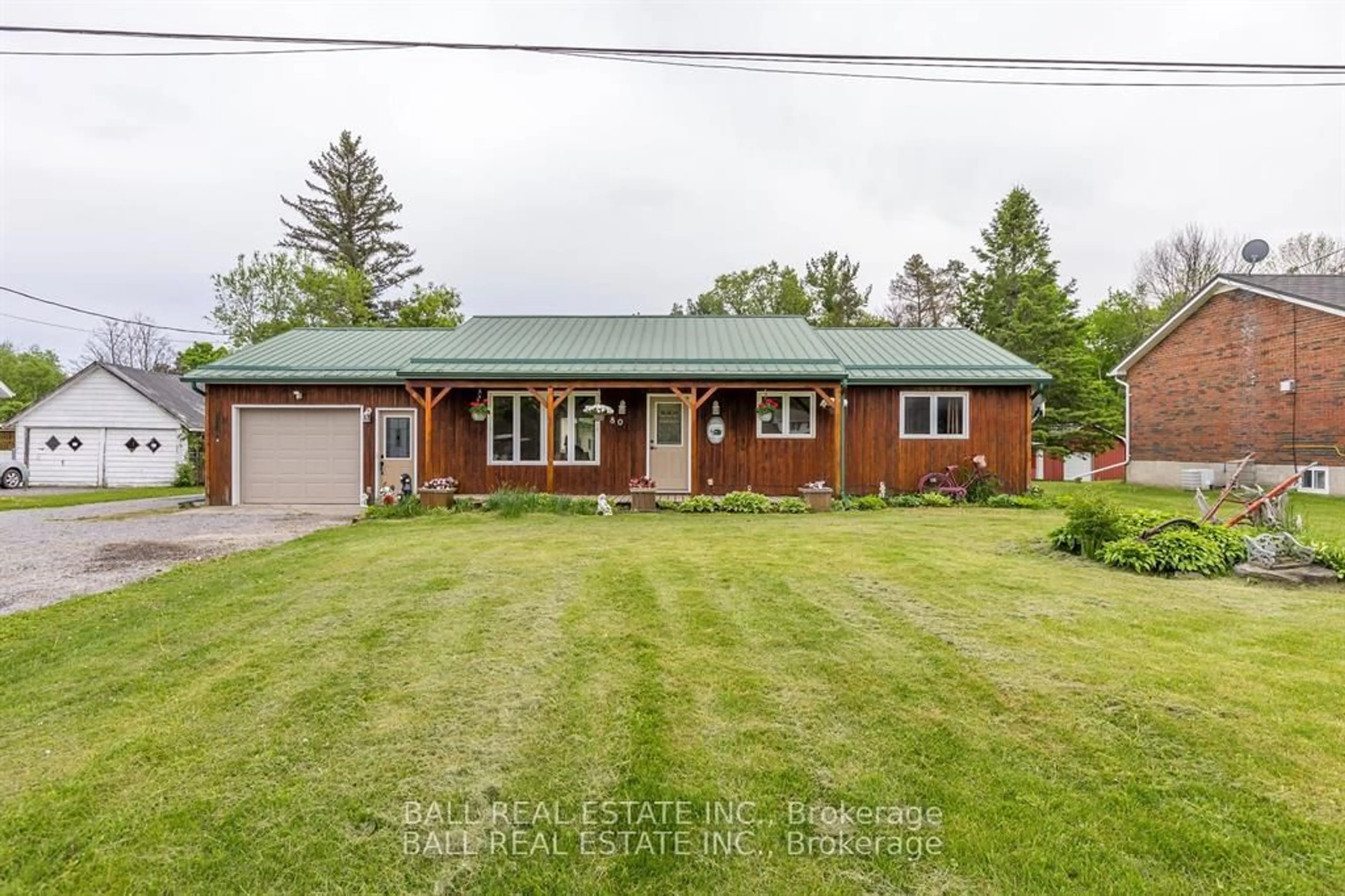A pic from outside/outdoor area/front of a property/back of a property/a pic from drone, street for 80 Matthew St, Limoges Ontario K0K 2M0