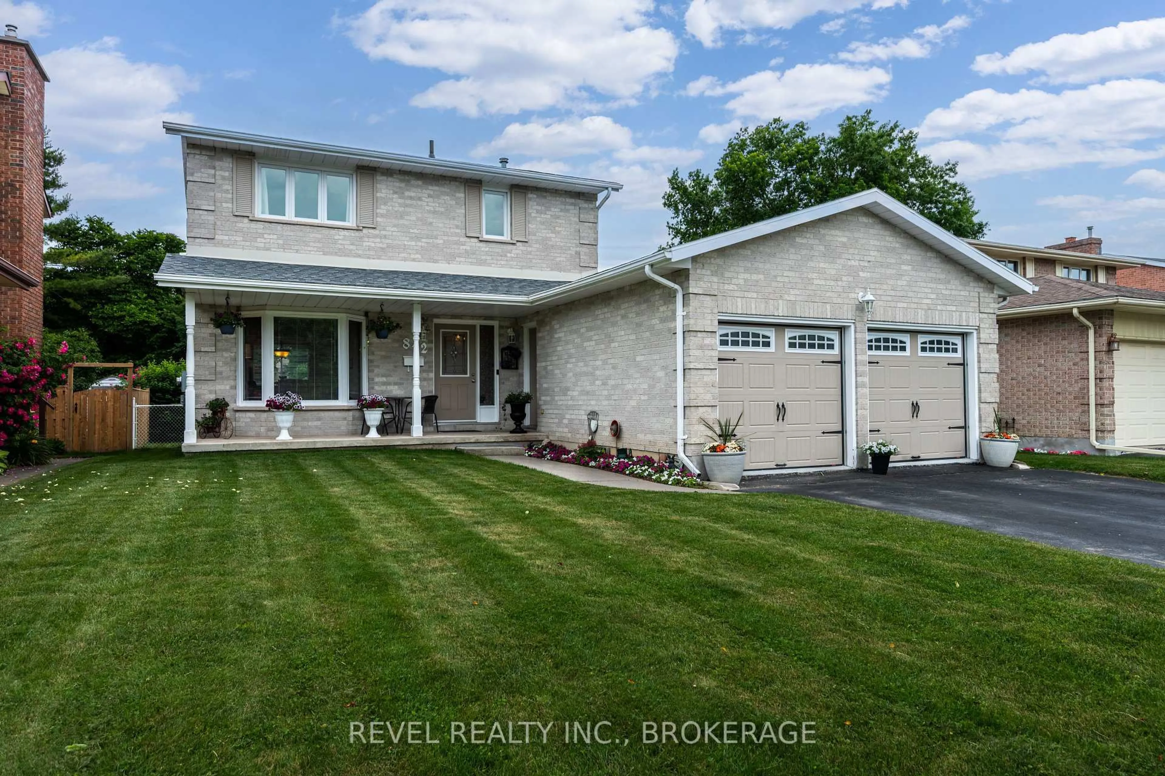 Home with vinyl exterior material, street for 842 Lancaster Dr, Kingston Ontario K7P 1R6