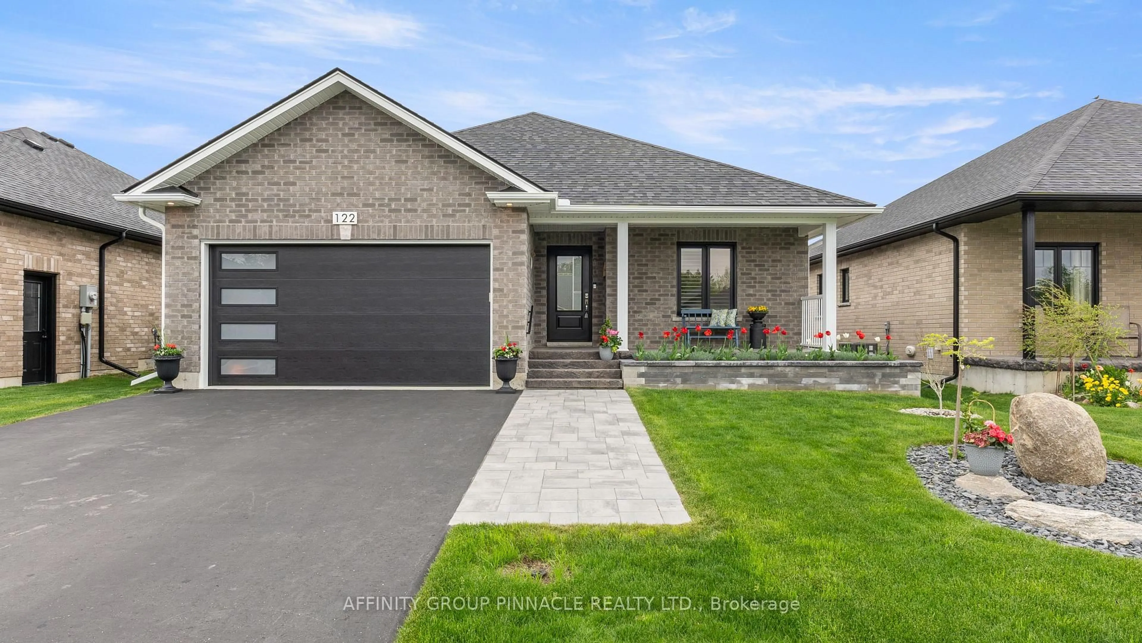Home with brick exterior material, street for 122 Springdale Dr, Kawartha Lakes Ontario K9V 0J3