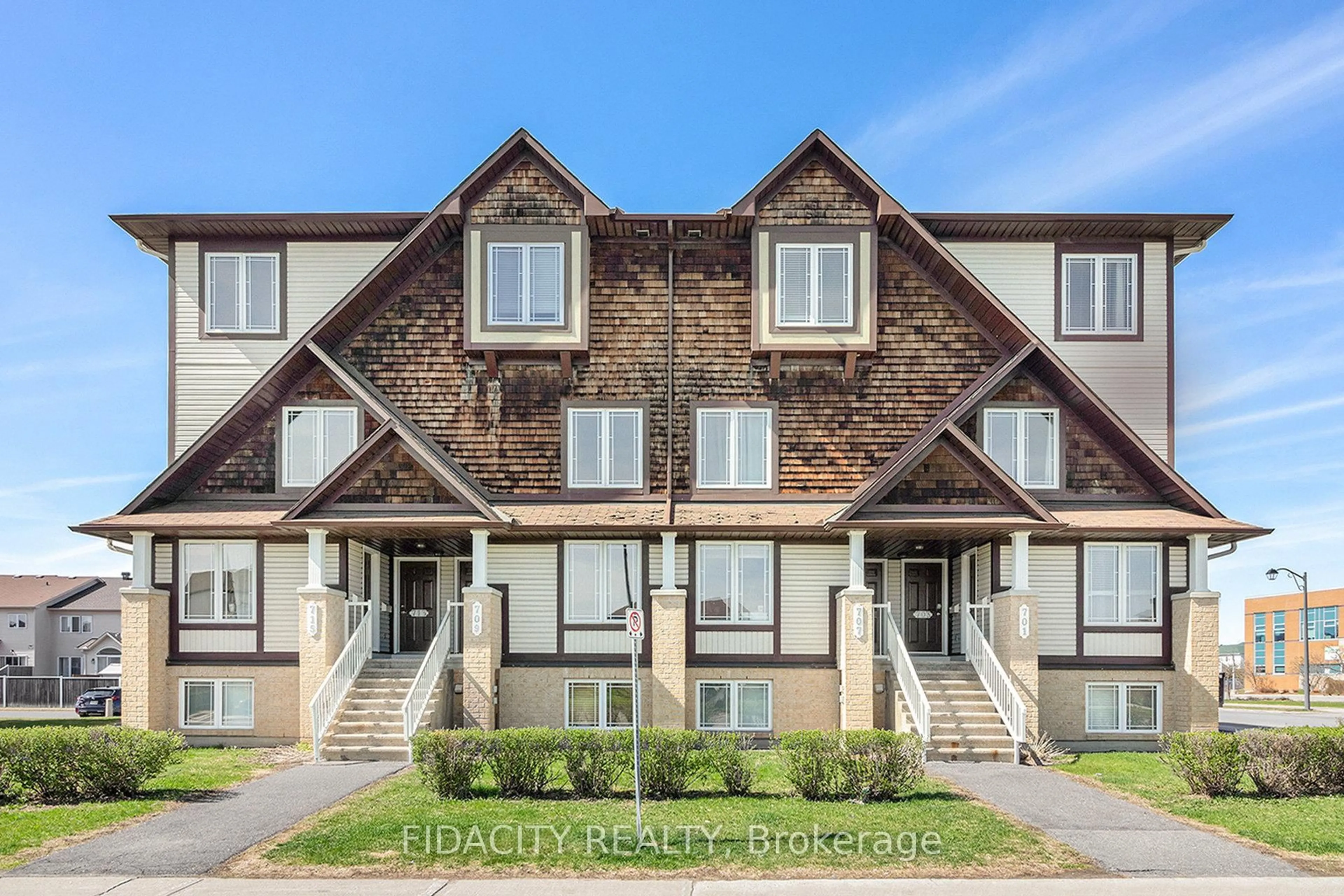 A pic from outside/outdoor area/front of a property/back of a property/a pic from drone, street for 711 Lakeridge Dr #3, Ottawa Ontario K4A 0N5