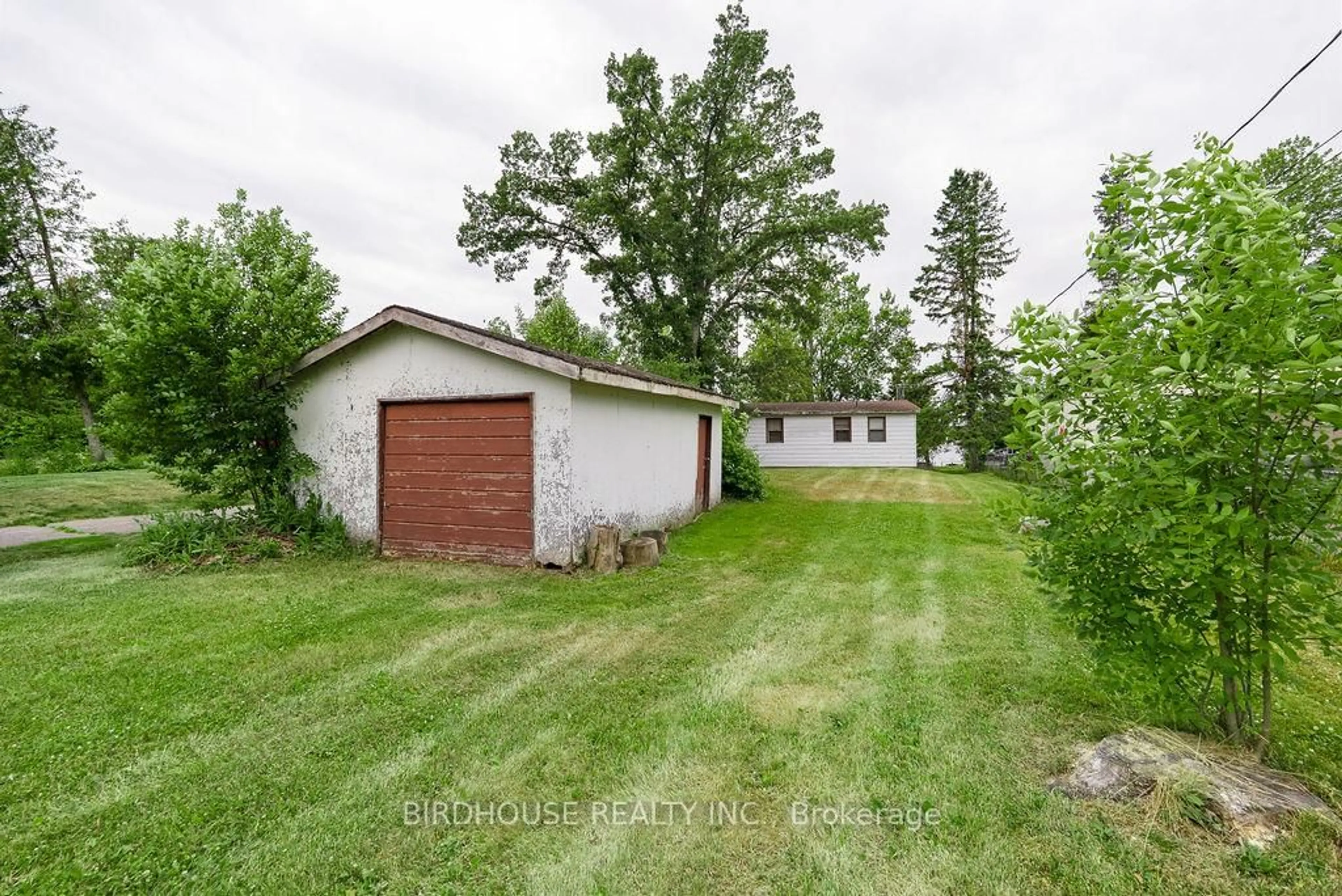 A pic from outside/outdoor area/front of a property/back of a property/a pic from drone, unknown for 58 Sturgeon Glen Rd, Kawartha Lakes Ontario K0M 1N0