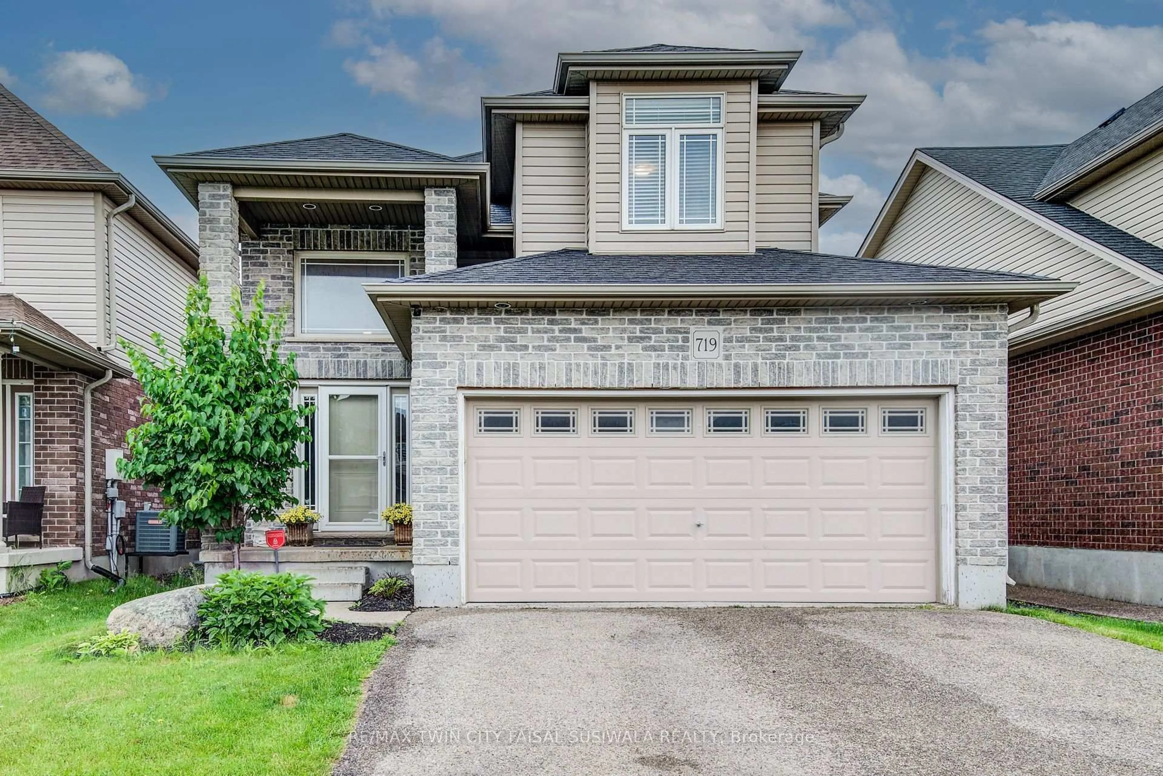 Home with brick exterior material, street for 719 Frontenac Cres, Woodstock Ontario N4V 0B1