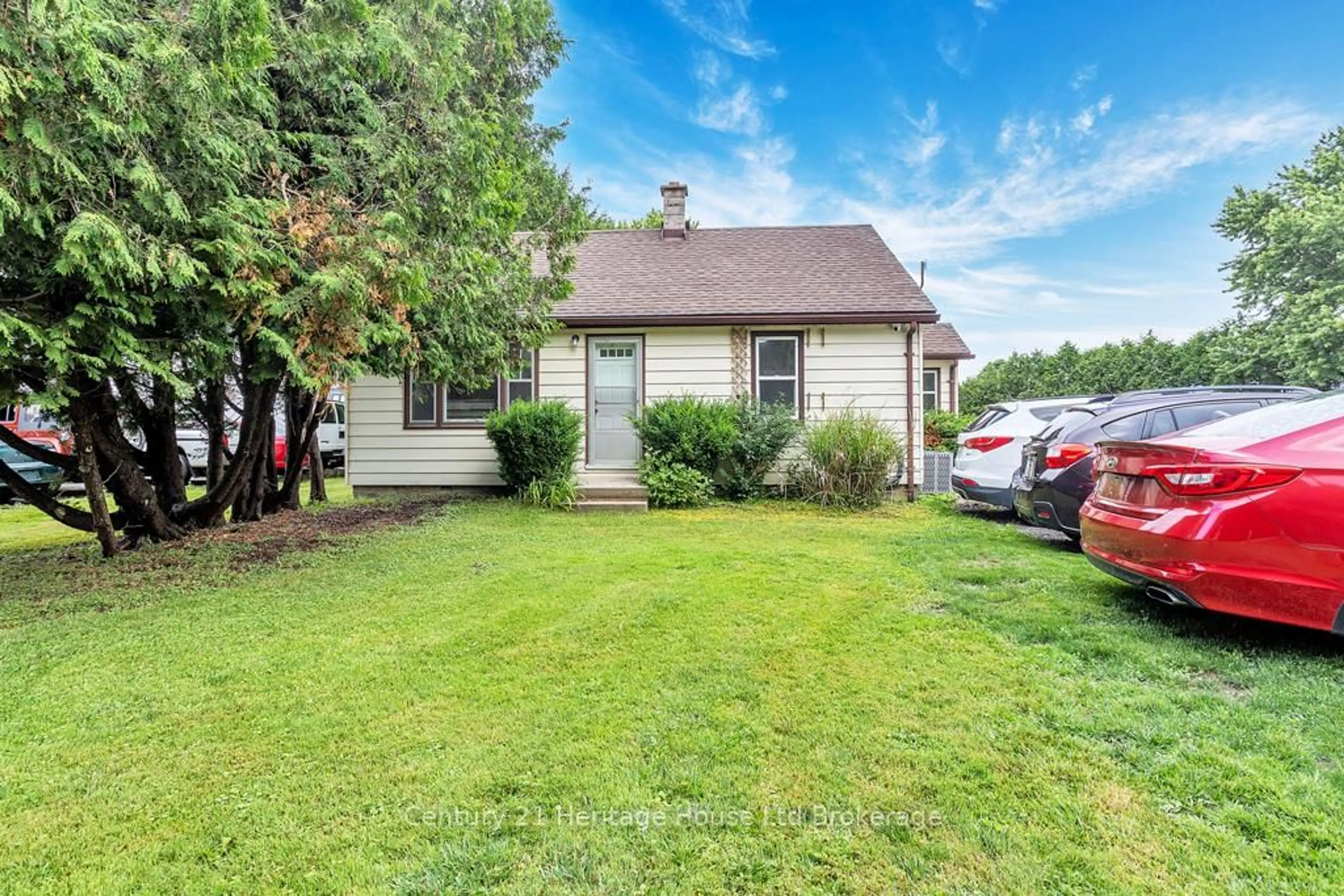 A pic from outside/outdoor area/front of a property/back of a property/a pic from drone, street for 715503 Oxford County 4 Rd, East Zorra-Tavistock Ontario N0J 1M0