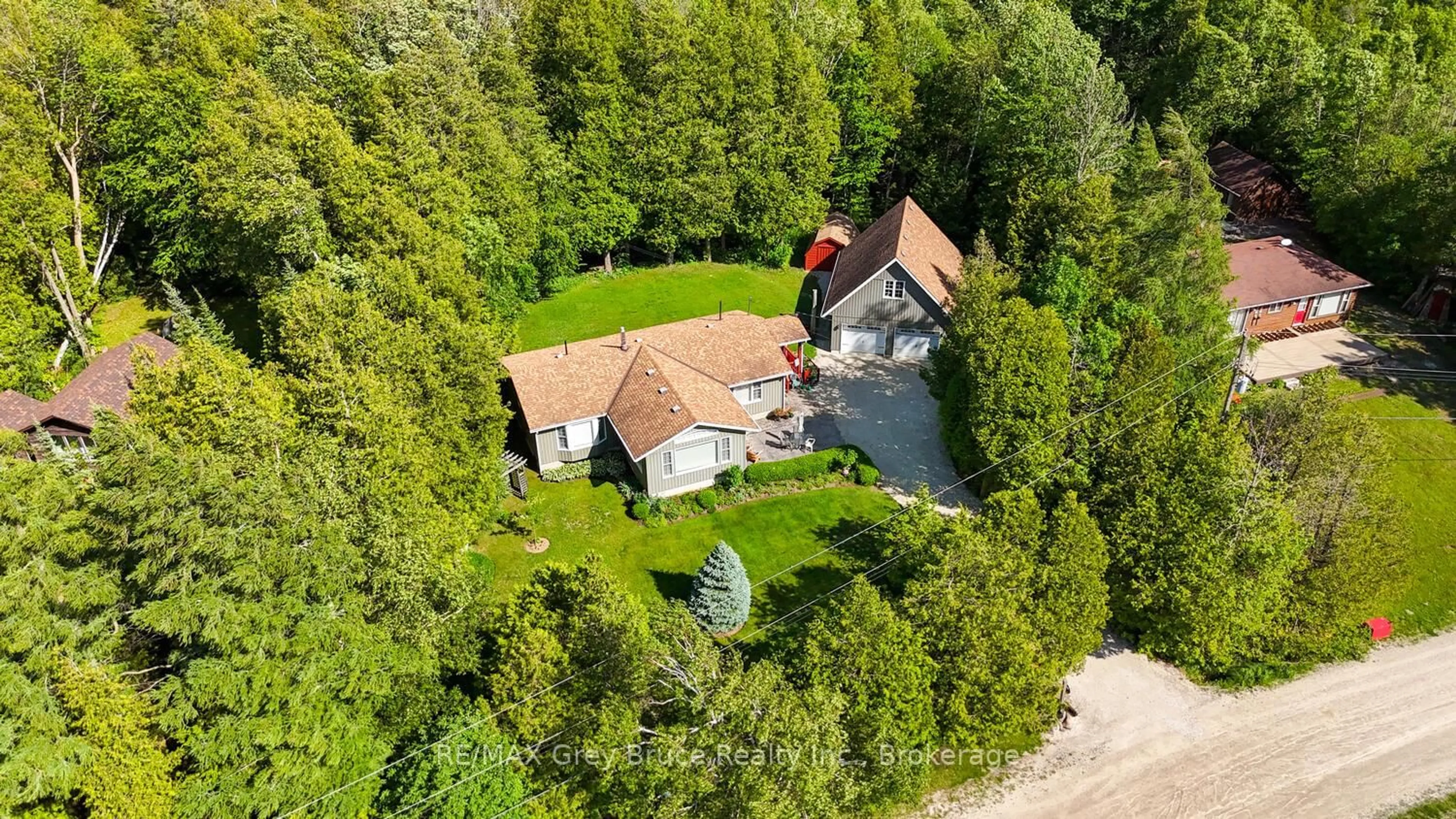 A pic from outside/outdoor area/front of a property/back of a property/a pic from drone, street for 186 Hope Bay Rd, South Bruce Peninsula Ontario N0H 2T0