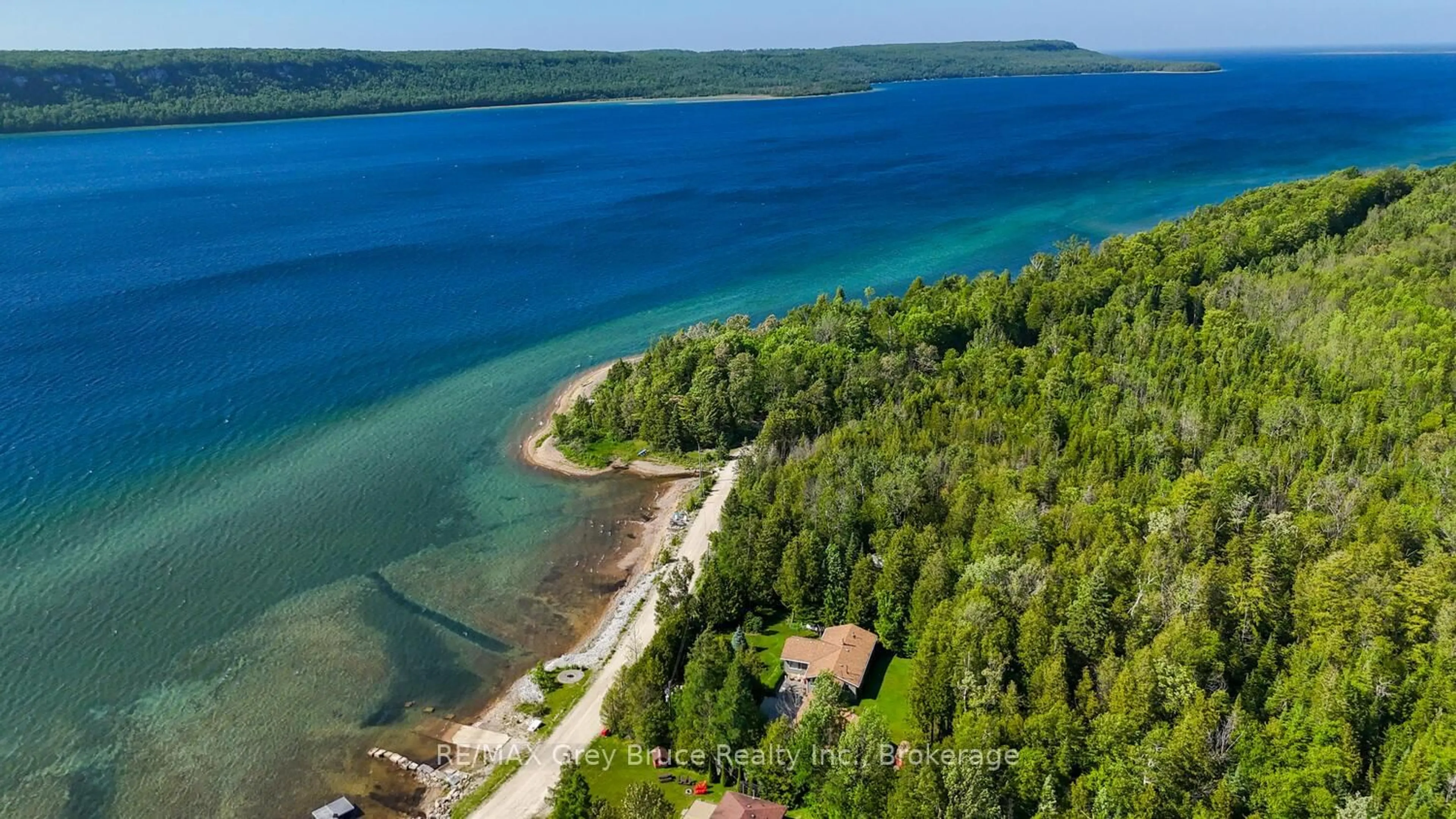 A pic from outside/outdoor area/front of a property/back of a property/a pic from drone, water/lake/river/ocean view for 186 Hope Bay Rd, South Bruce Peninsula Ontario N0H 2T0